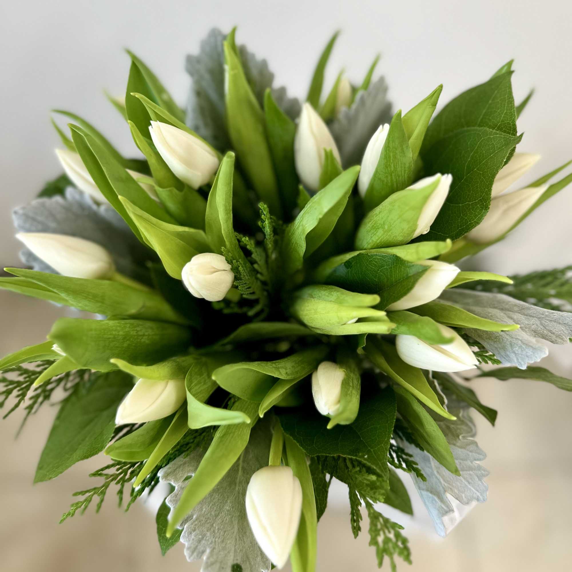 Brighten your day with the enchanting "Spring Whisper" arrangement from Westford Florist