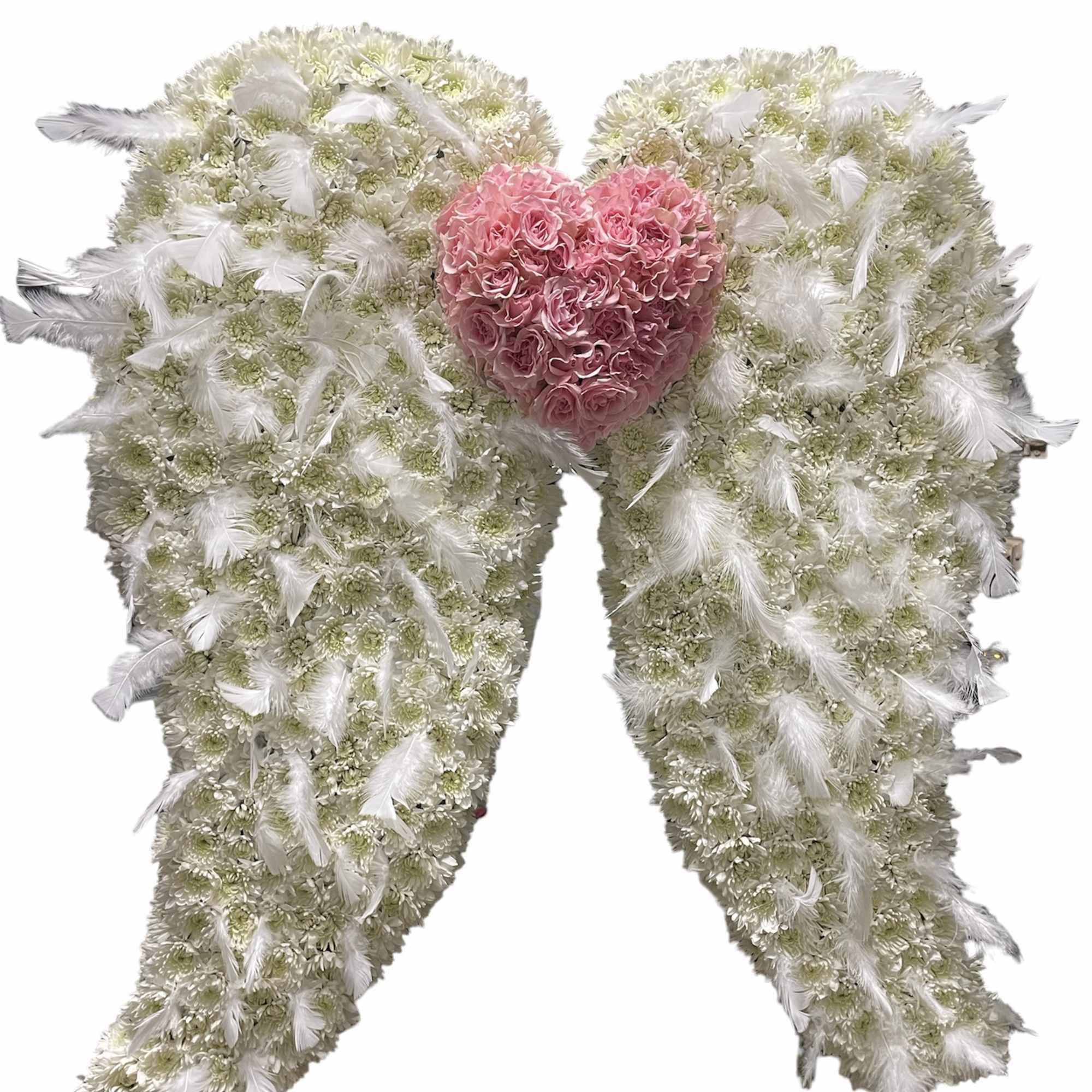 Heart-shaped floral tribute with pink roses and white flowers