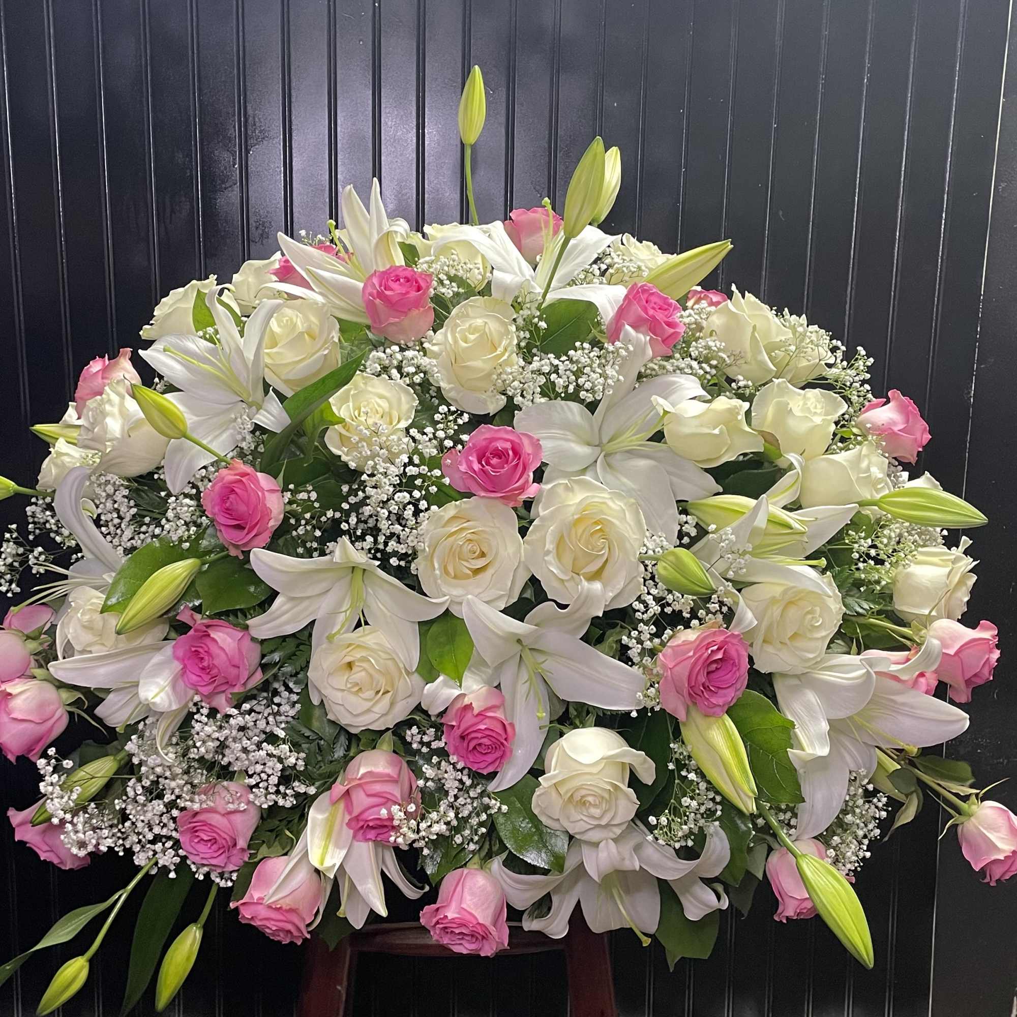 Large bouquet of white lilies and pink and white roses