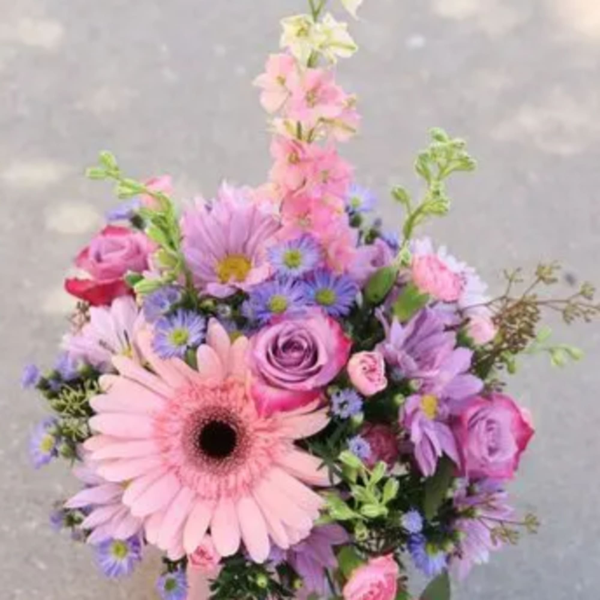 Pink and purple mixed bouquet with a large gerbera daisy