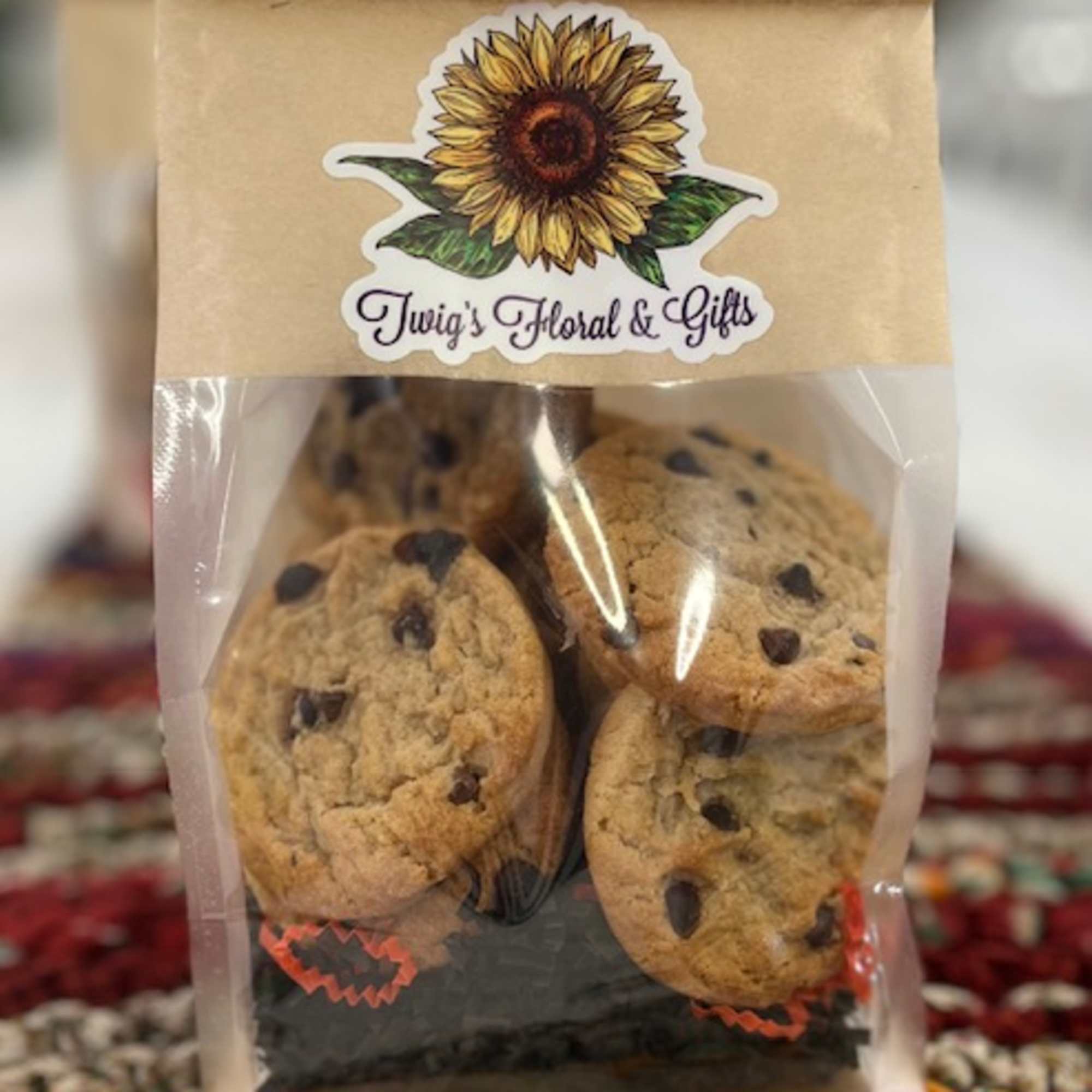 Bag of chocolate chip cookies with a sunflower logo label