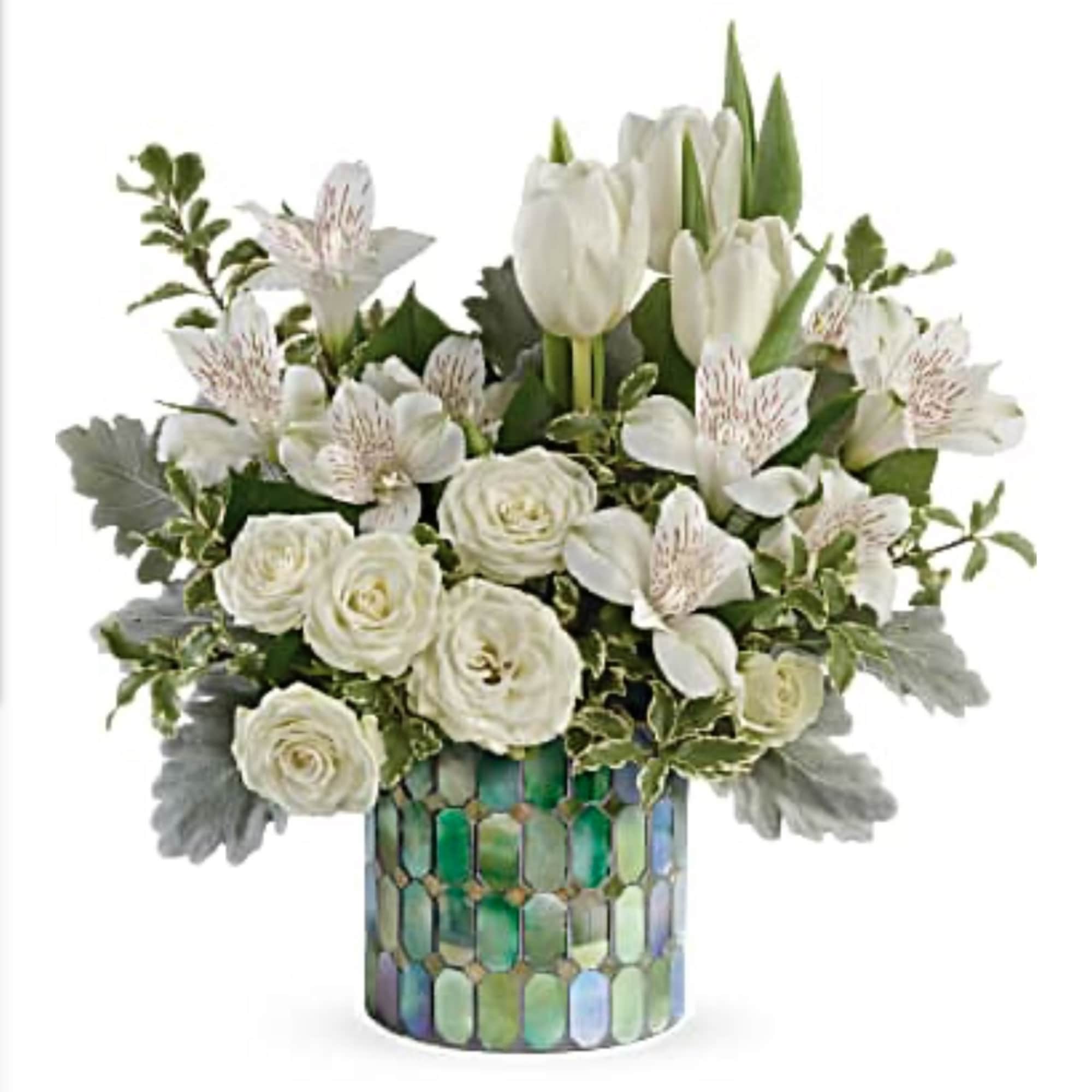 White tulips and roses in a mosaic glass vase