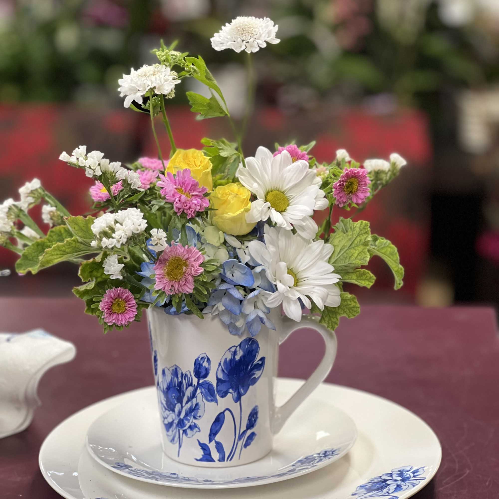 A bright, casual tabletop arrangement that feels like a sunny spring visit-this