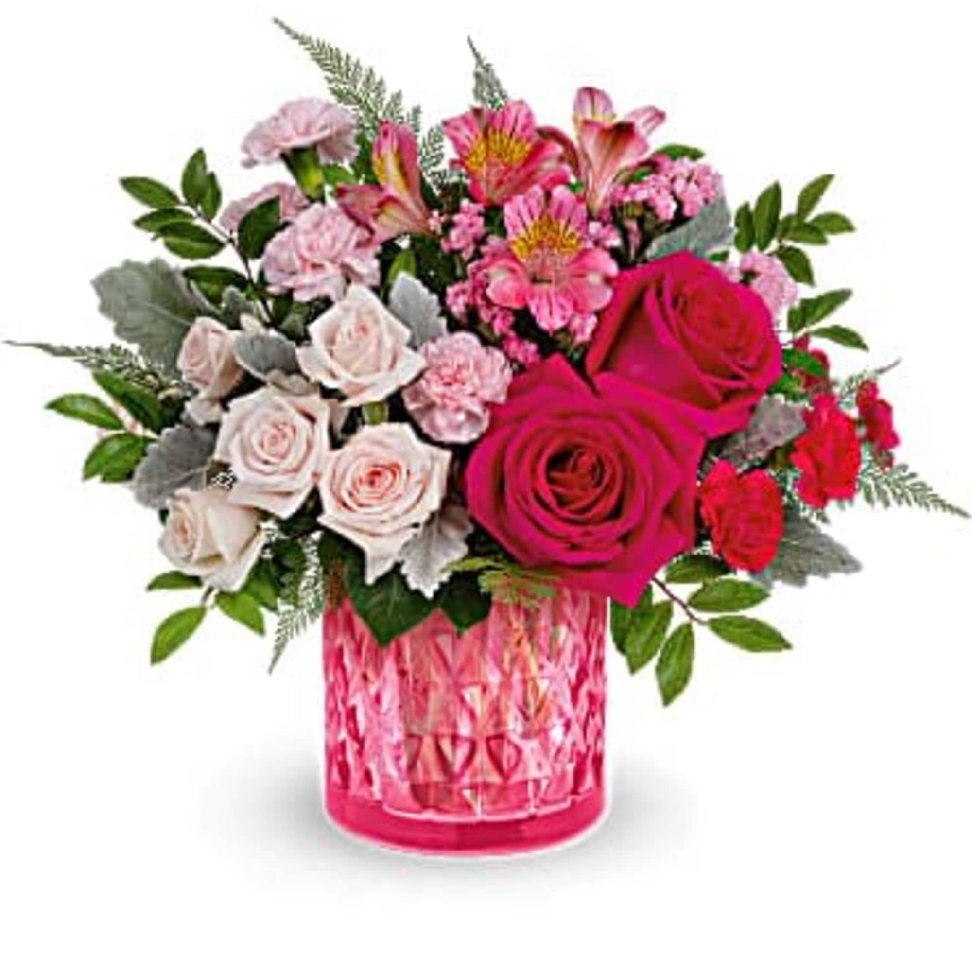 Pink and white mixed flower bouquet in a pink glass vase