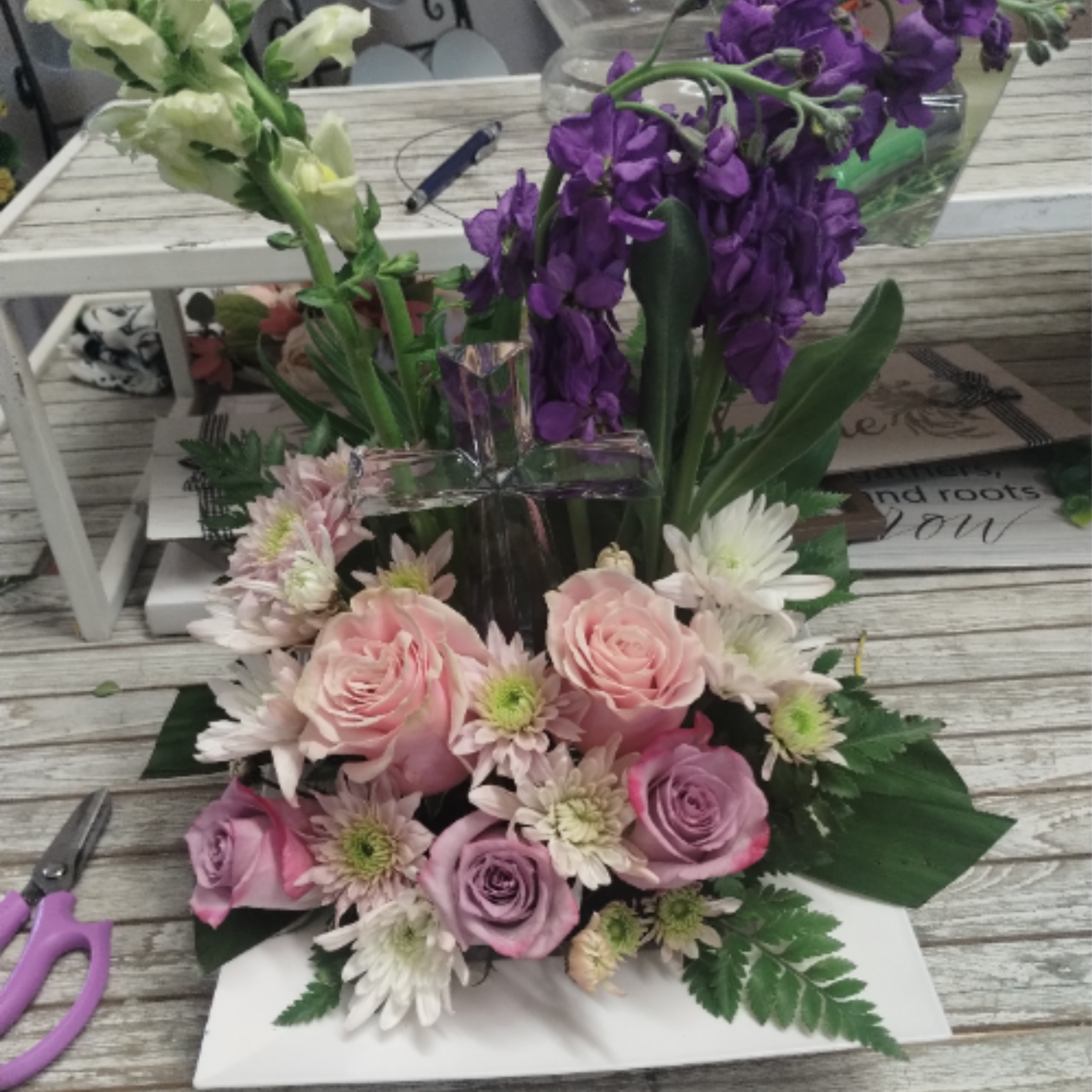 This Grace &amp; Glory arrangement, with a crystal cross, is a beautiful