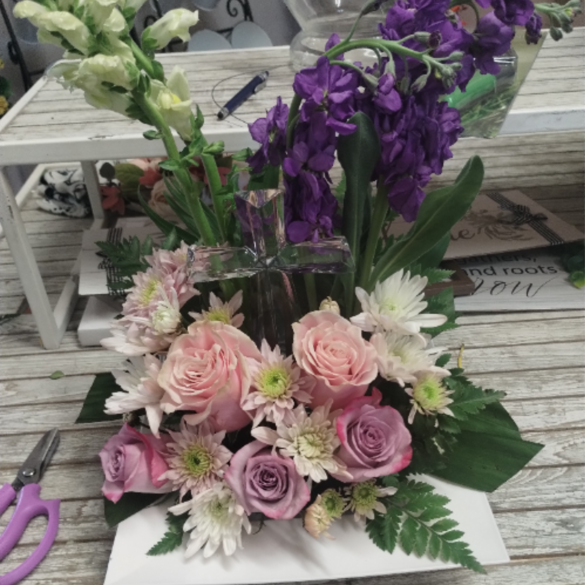 This Grace &amp; Glory arrangement, with a crystal cross, is a beautiful