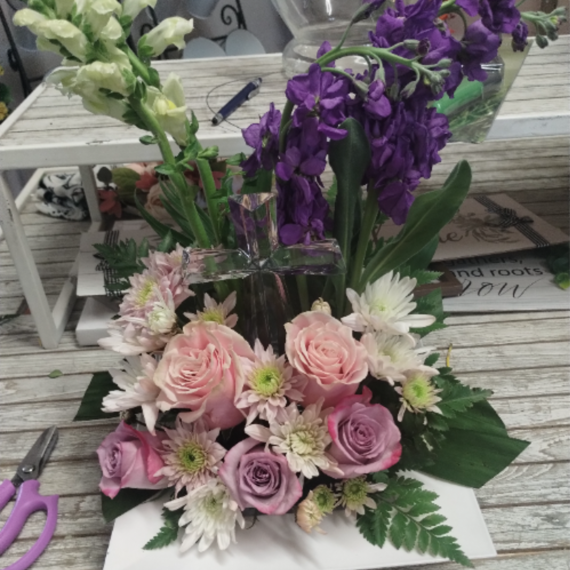 This Grace &amp; Glory arrangement, with a crystal cross, is a beautiful
