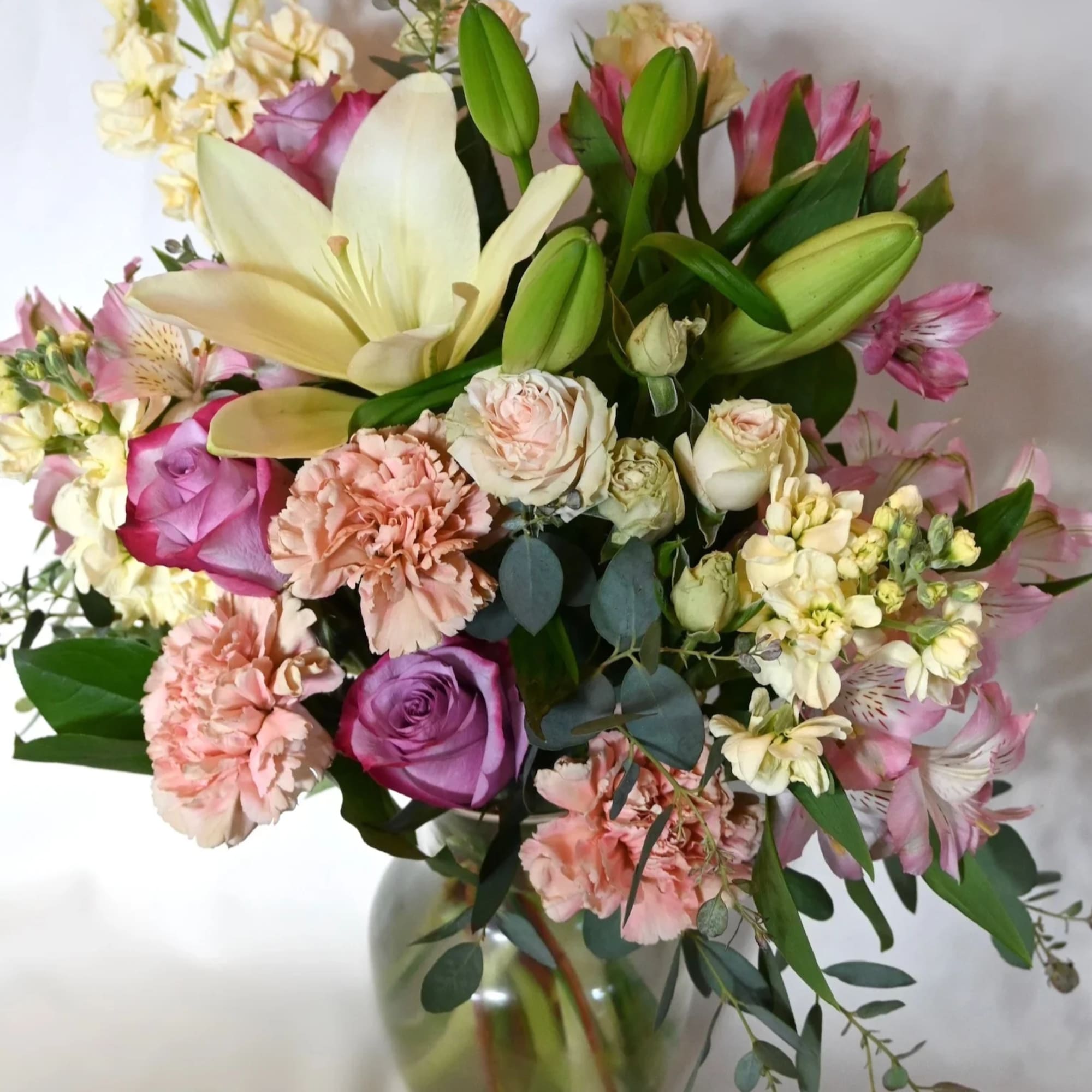 Enjoy the beauty of our one-of-a-kind garden-inspired floral arrangement. Bursting with vibrant, photo 2 of 3
