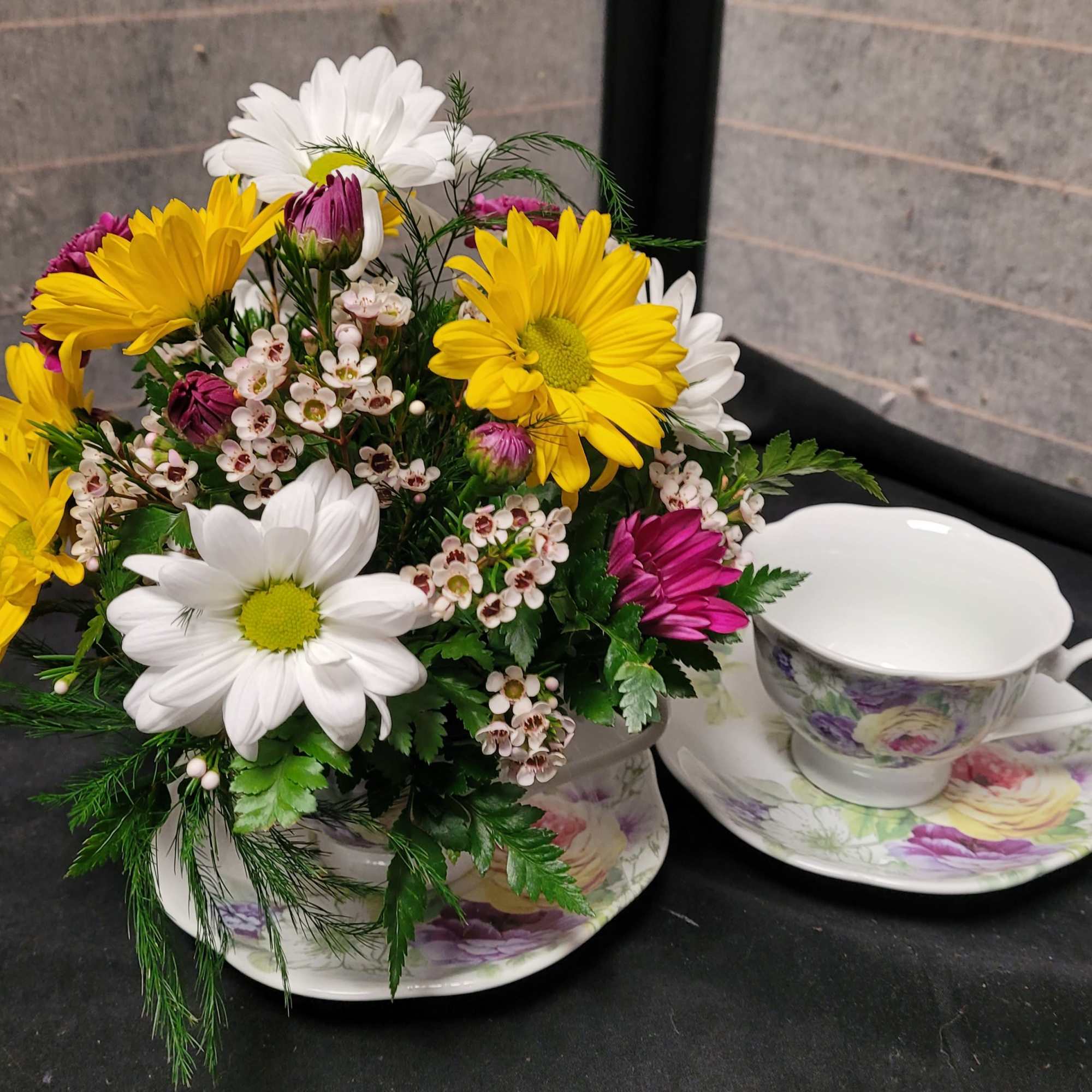 A cozy cluster of mixed roses, daisies, alstroemeria and chrysanthemums arranged in, photo 4 of 5
