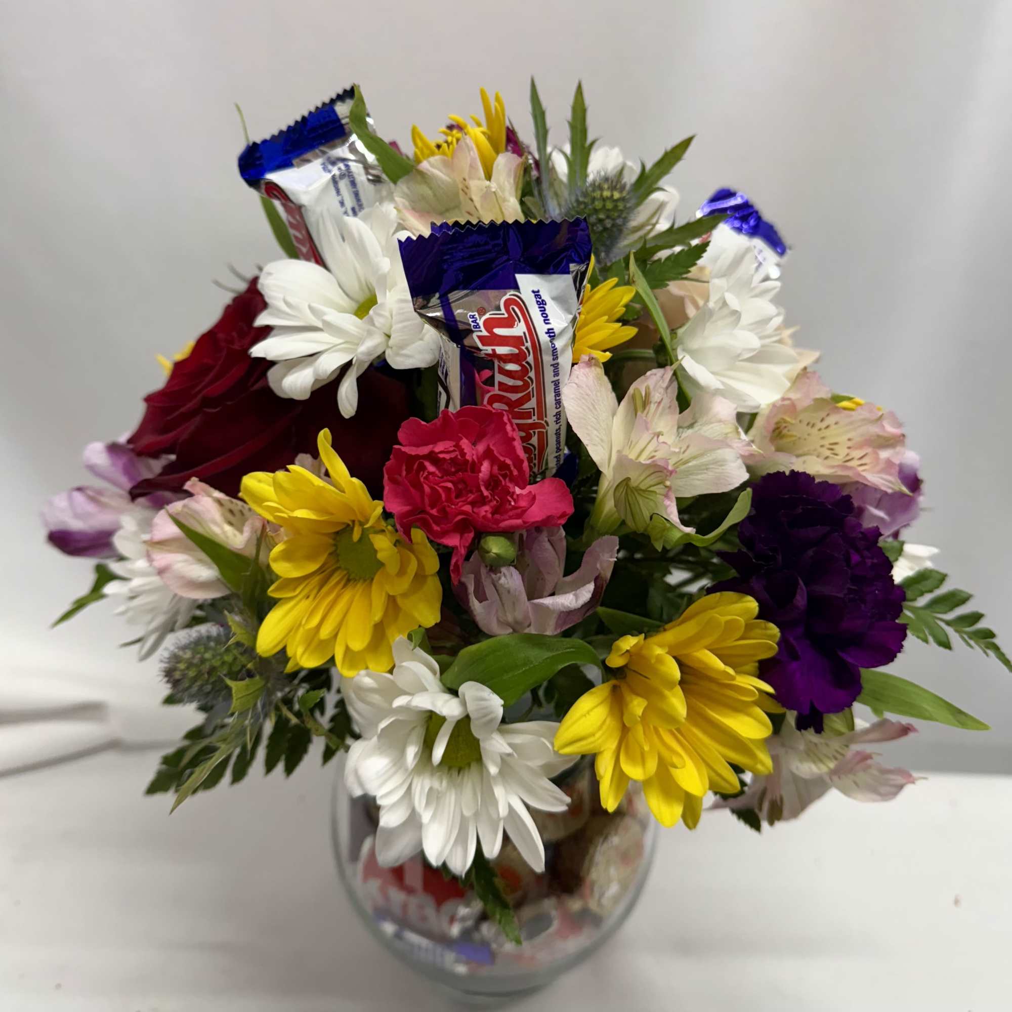 A cheerful mixed-color flower arrangement, making it a joyful choice for a, photo 2 of 2