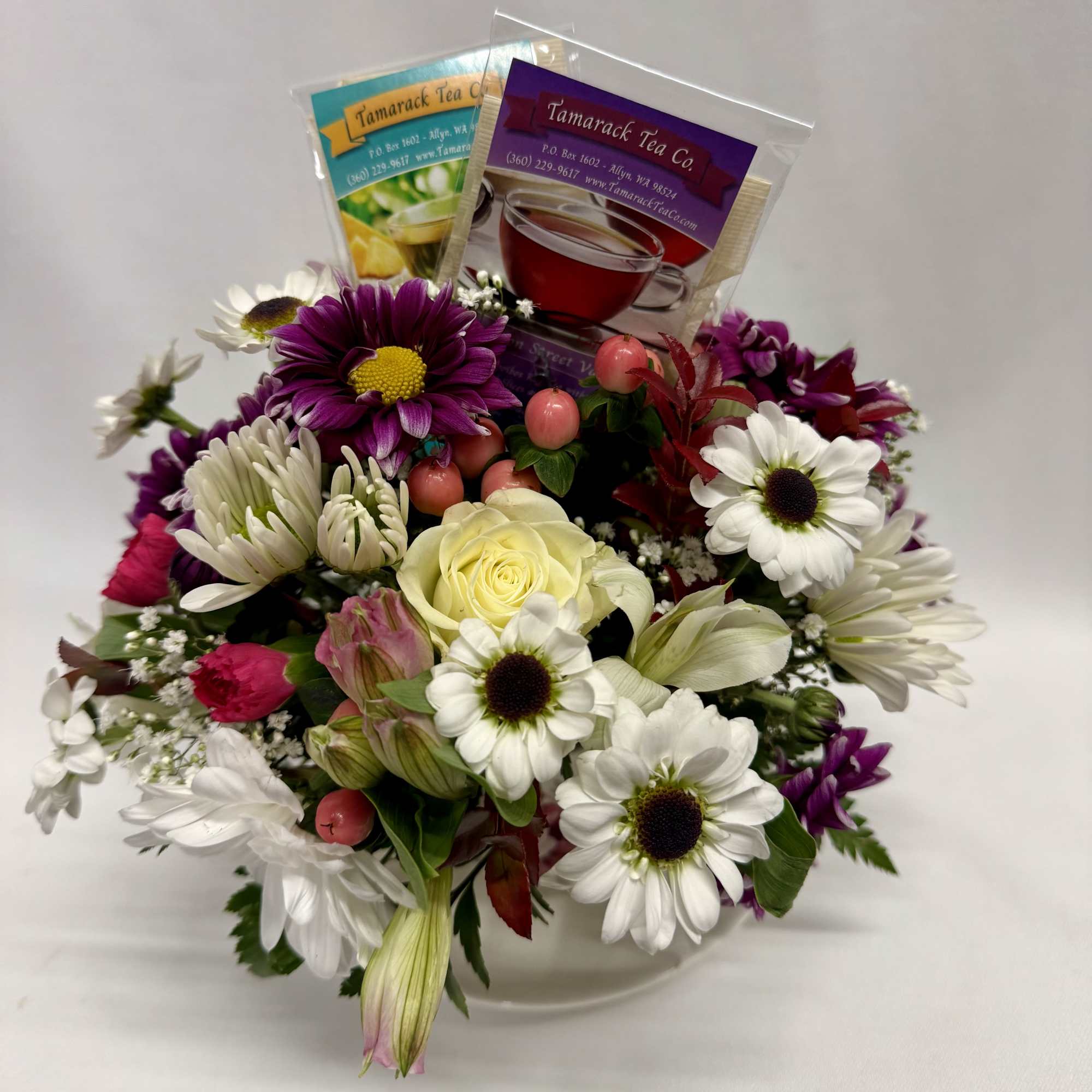 A cozy cluster of mixed roses, daisies, alstroemeria and chrysanthemums arranged in, photo 4 of 4