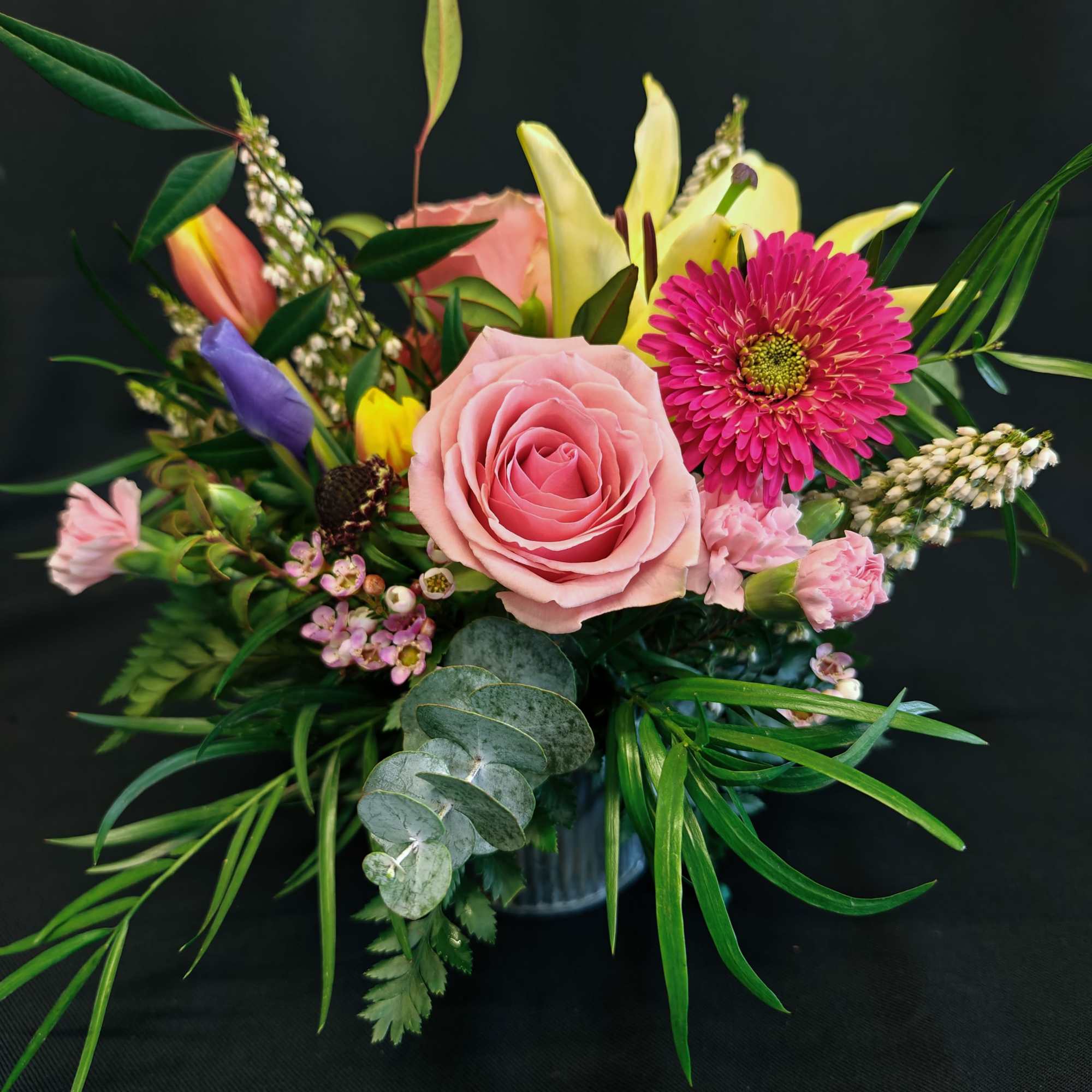 Just a handful of seasonal flowers and a nice assortment of foliage