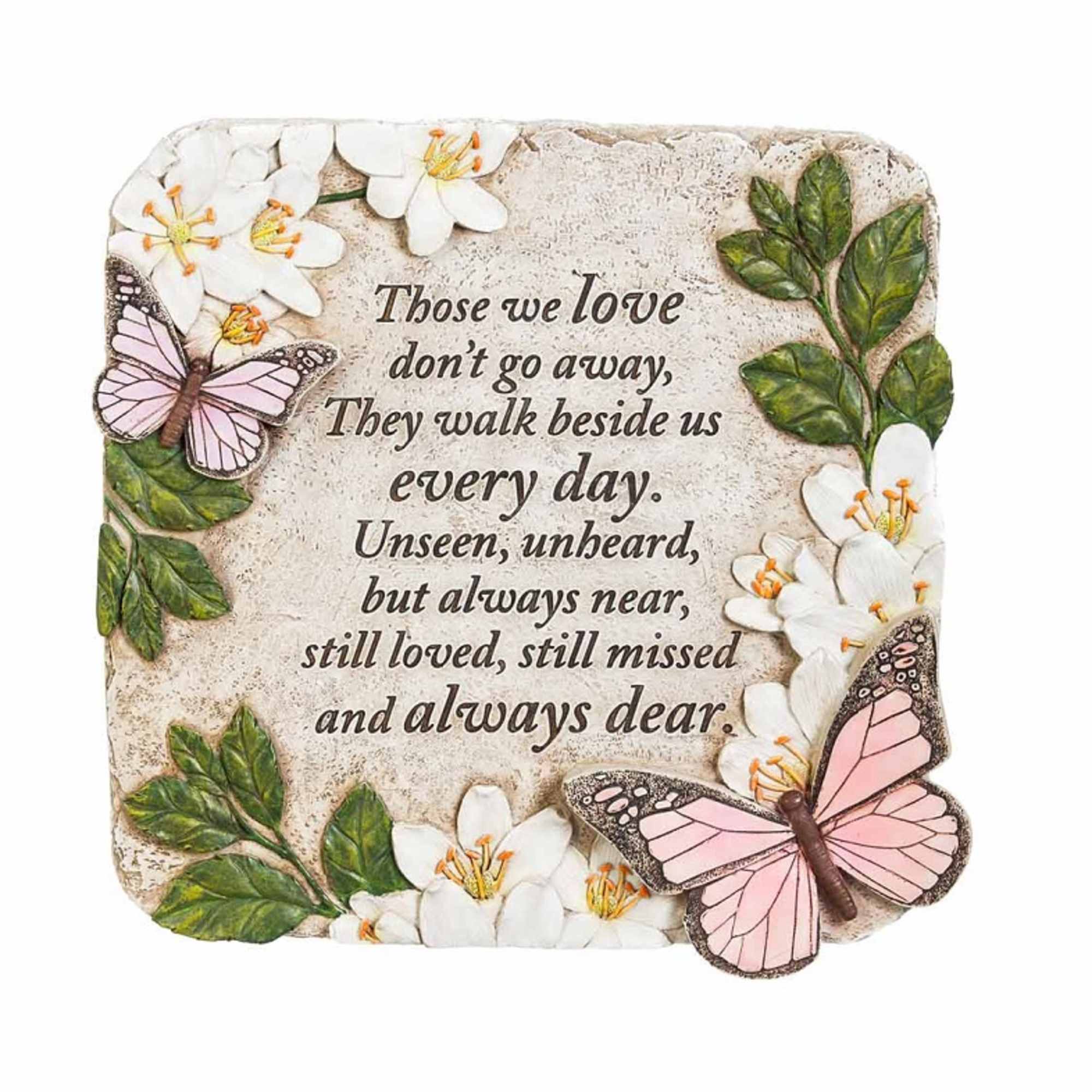 Decorative memorial plaque with flowers, butterflies, and a sympathy quote