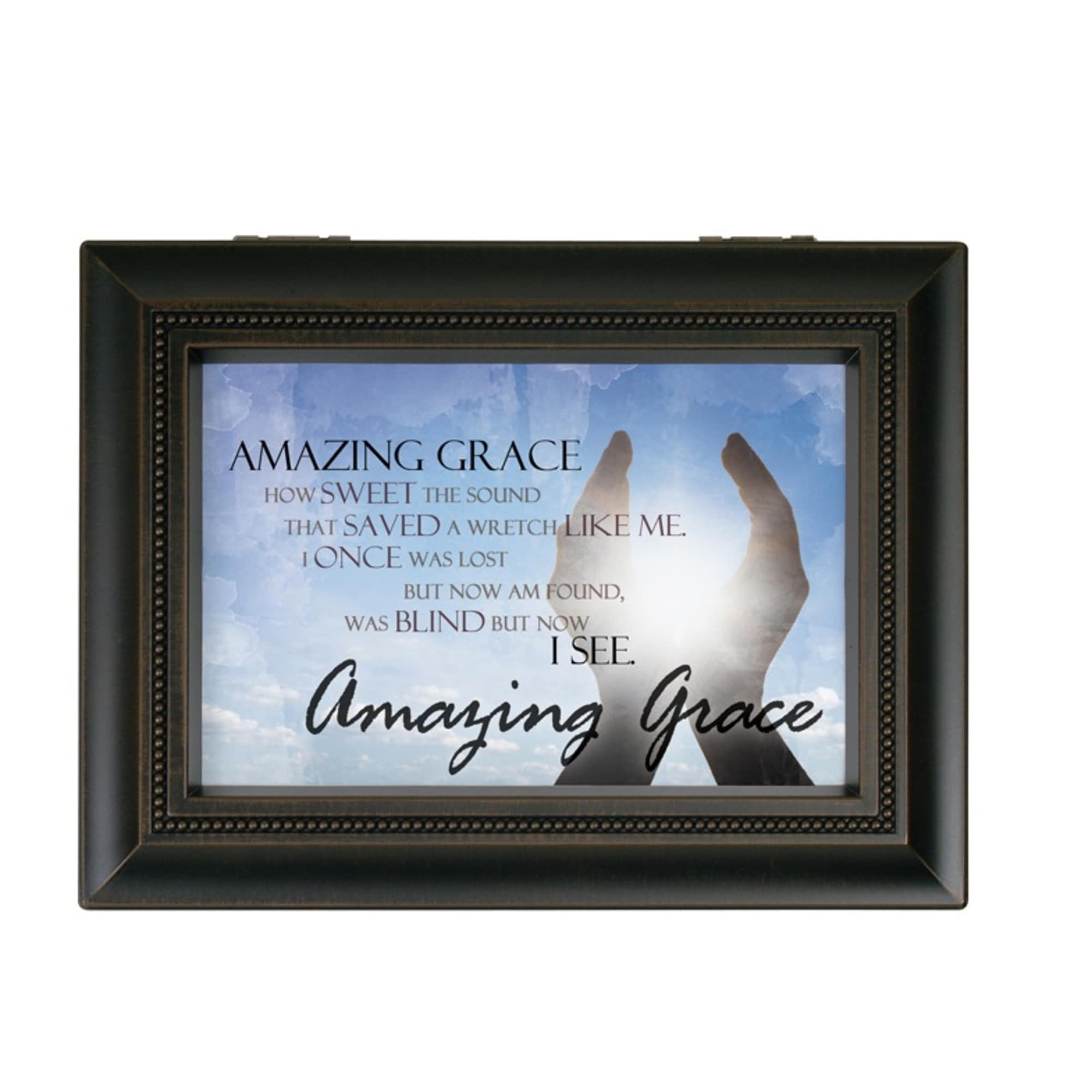 Framed wall art with the words Amazing Grace and raised hands
