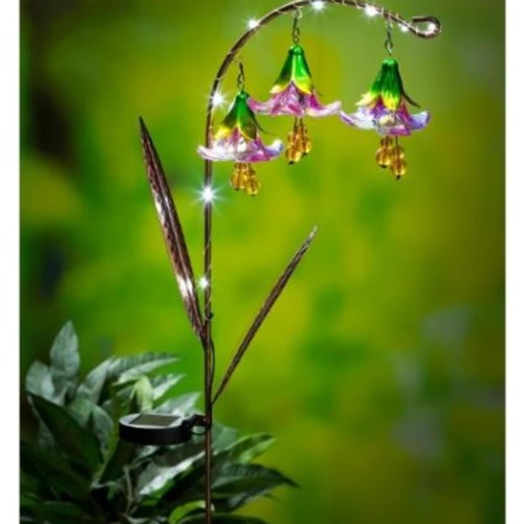 Decorative hanging flower-shaped lights on a curved metal stand
