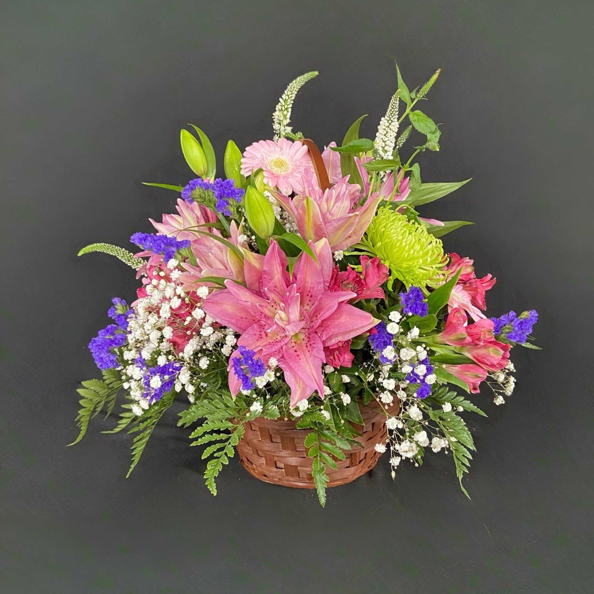A delightful basket filled with fragrant flowers including Stargazer Lilies, Alstroemeria, Gerbera