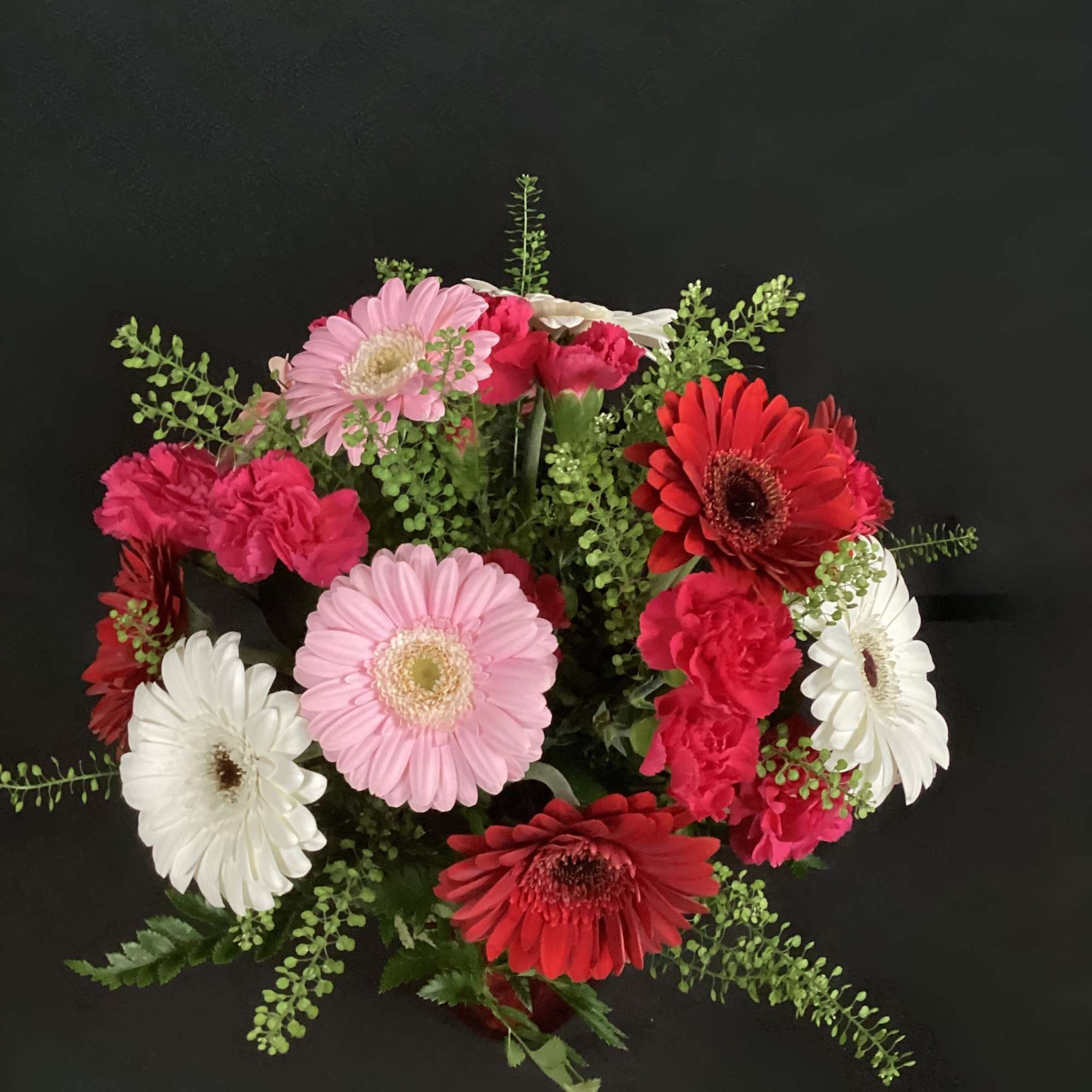 An instant brightener, send somebody a jar full of Gerbera Daisies. To