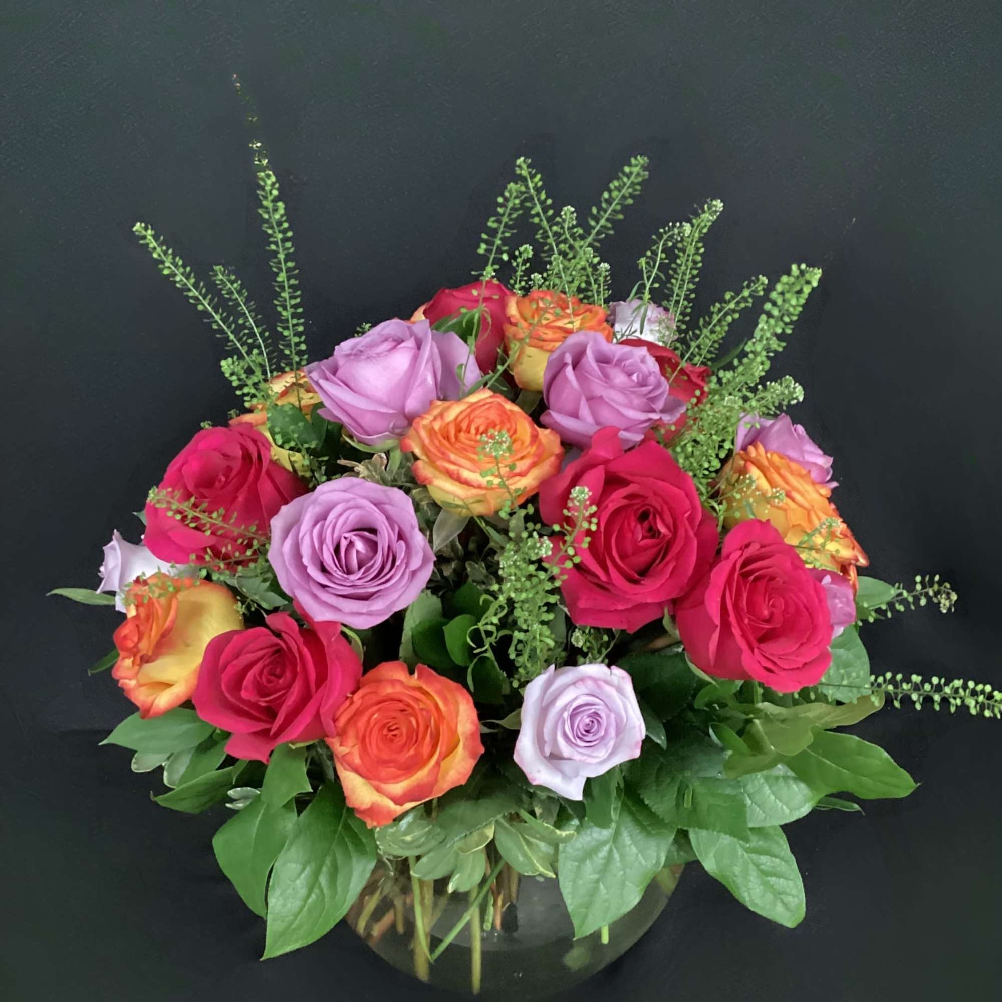 A lovely bowl of colorful roses brightens and lifts any room (and