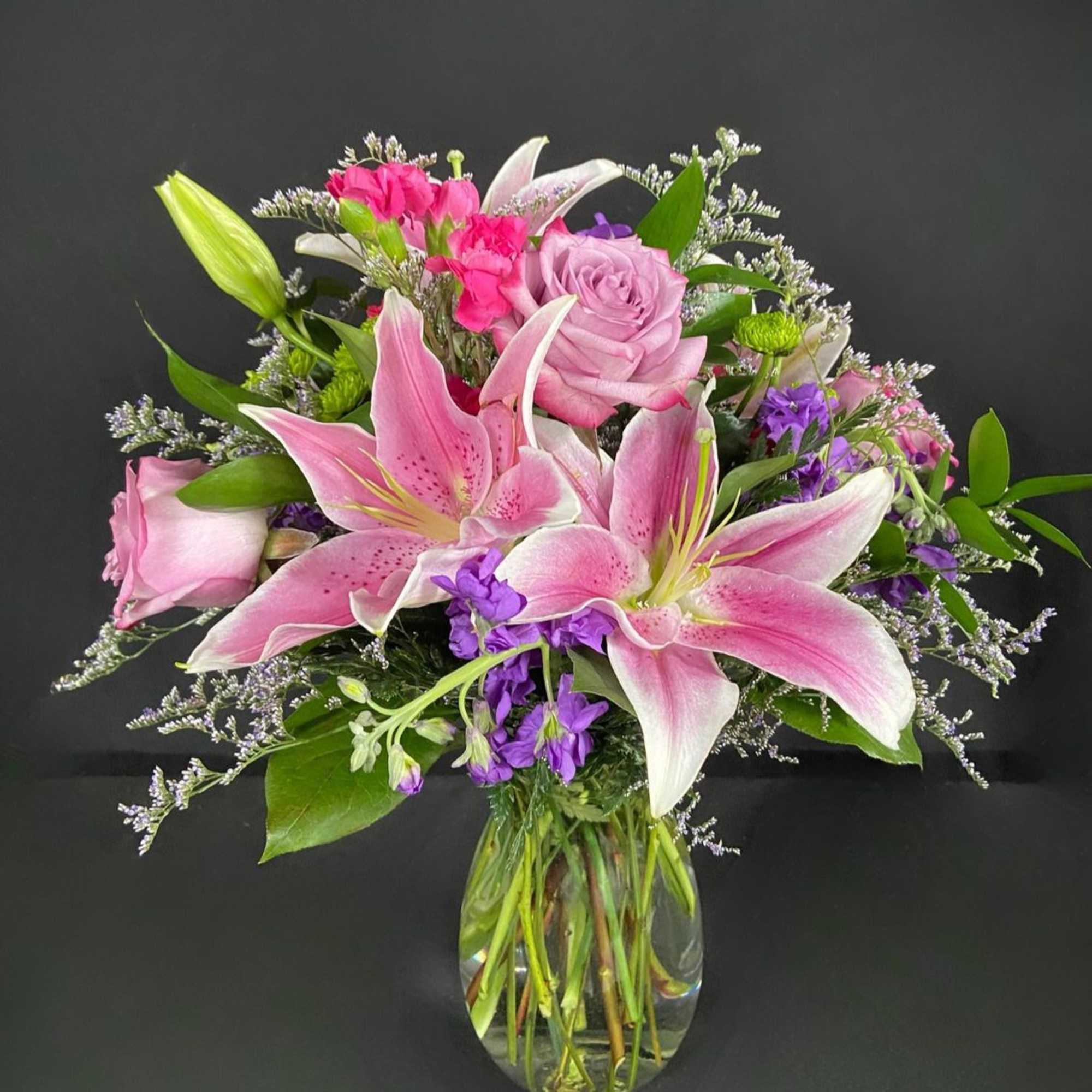 Grab their attention and make them starstruck with this breathtaking arrangement center