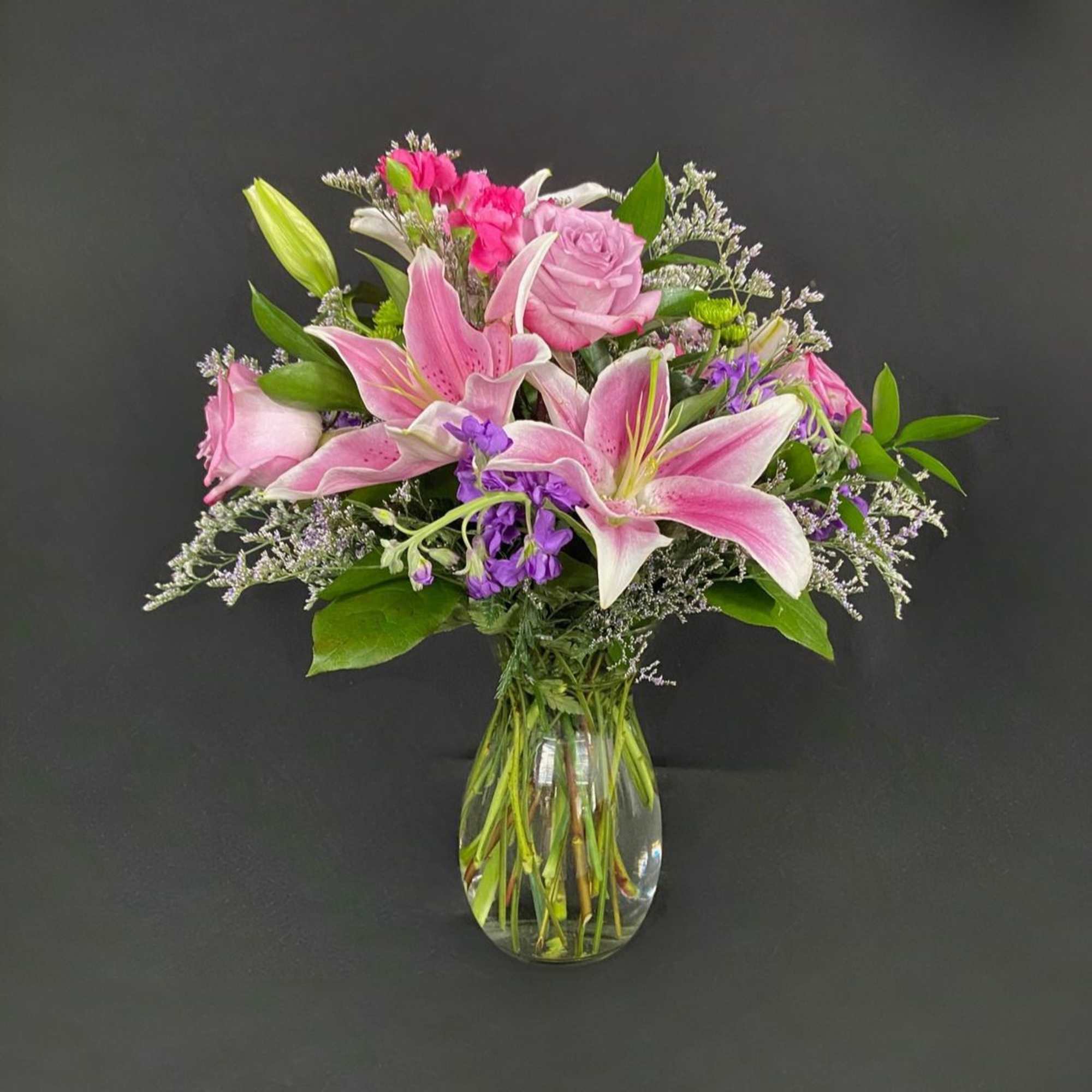 Grab their attention and make them starstruck with this breathtaking arrangement center