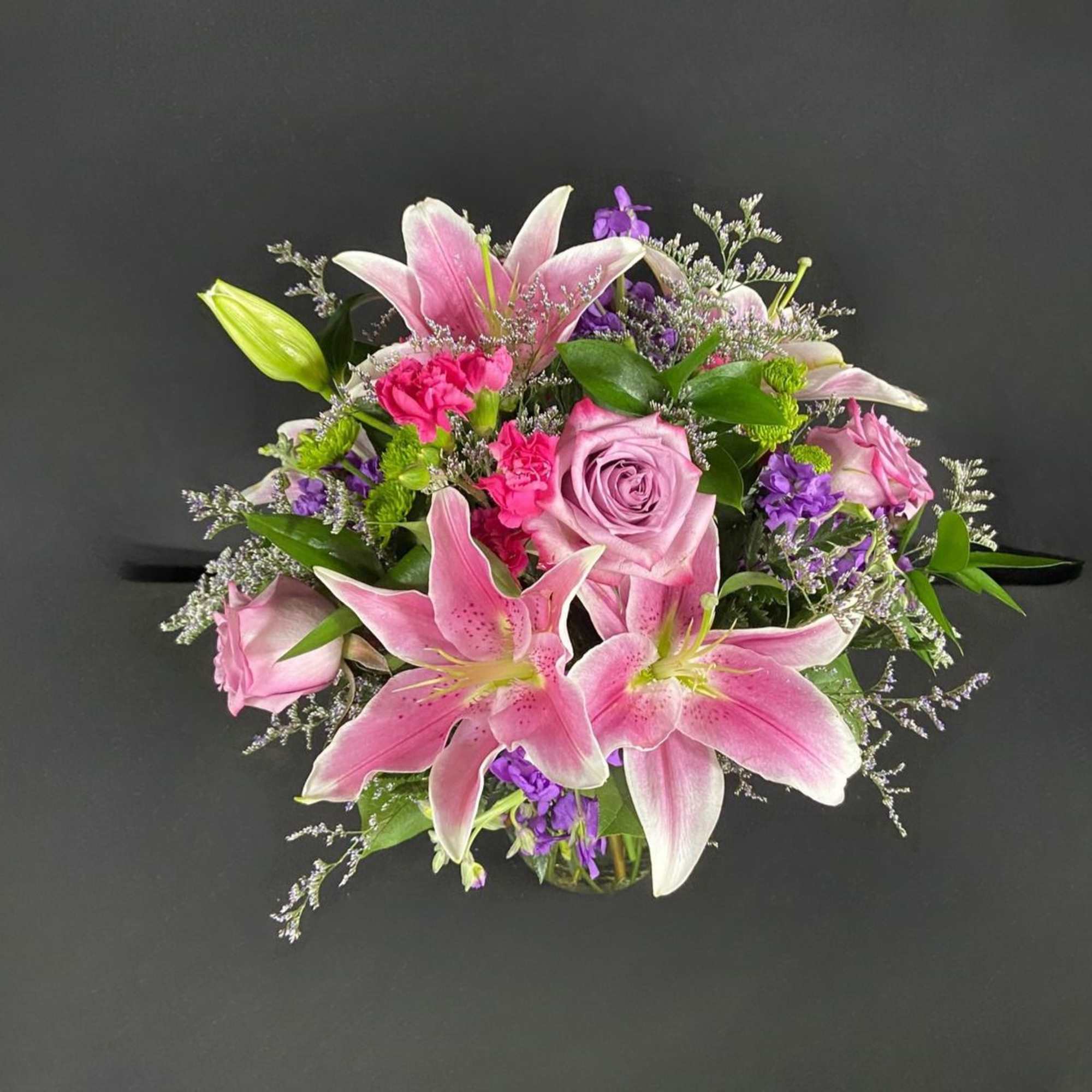 Grab their attention and make them starstruck with this breathtaking arrangement center