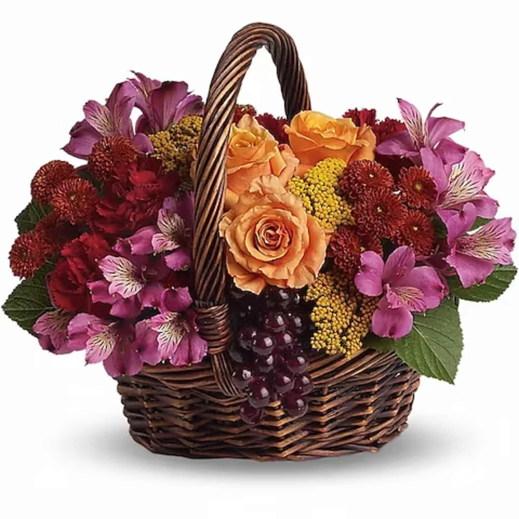 Basket of orange roses and purple flowers