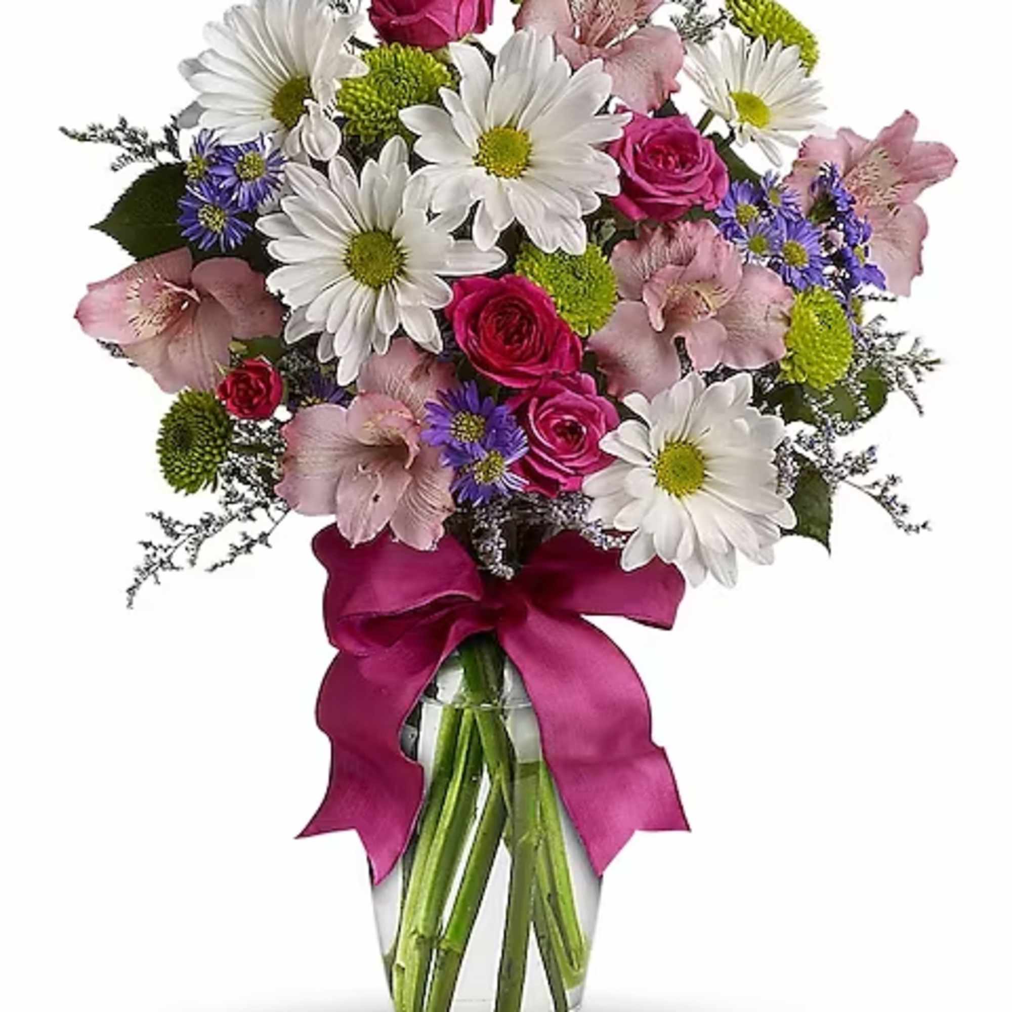 Bouquet of white daisies, pink roses, and pink alstroemeria in a glass vase