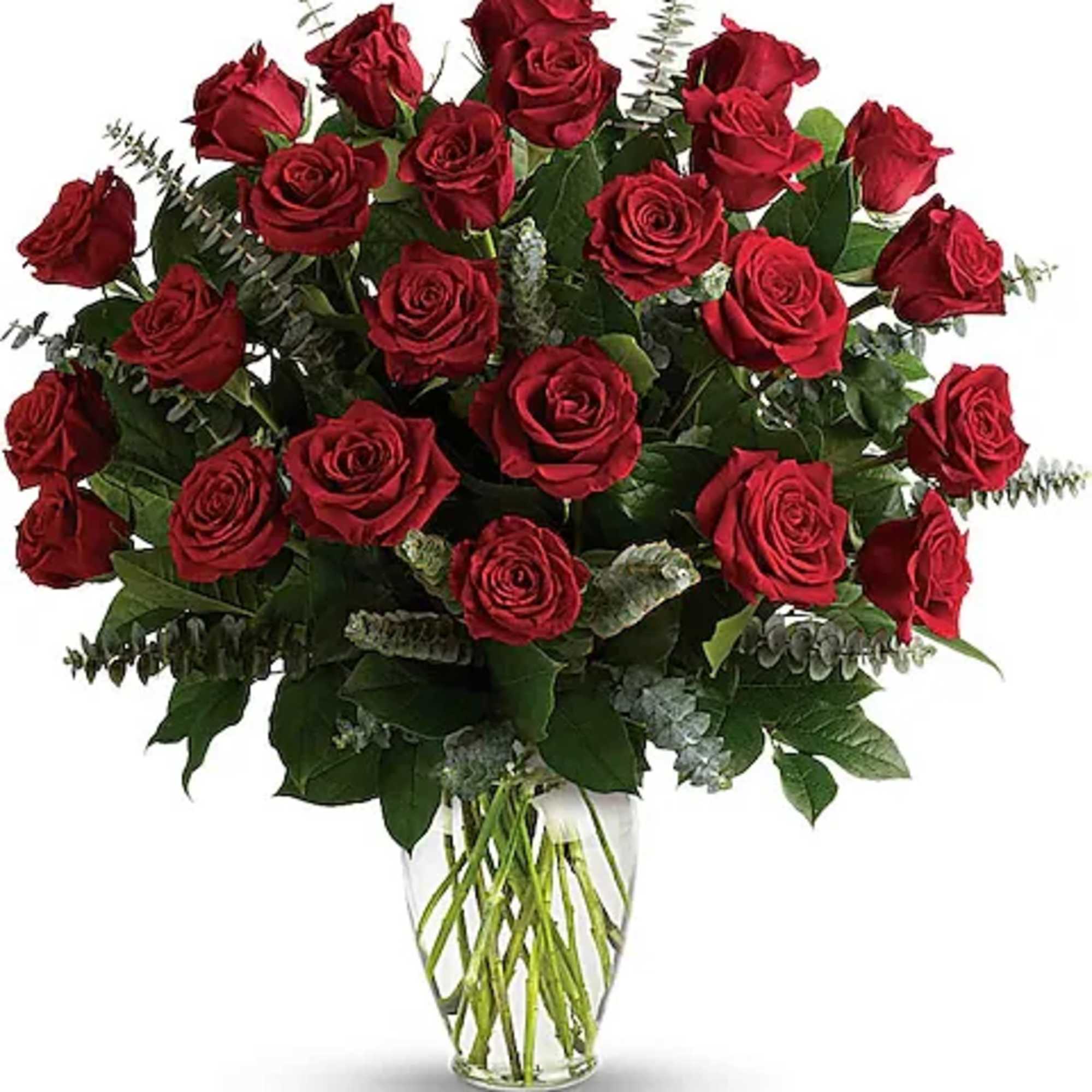 Bouquet of red roses in a clear glass vase