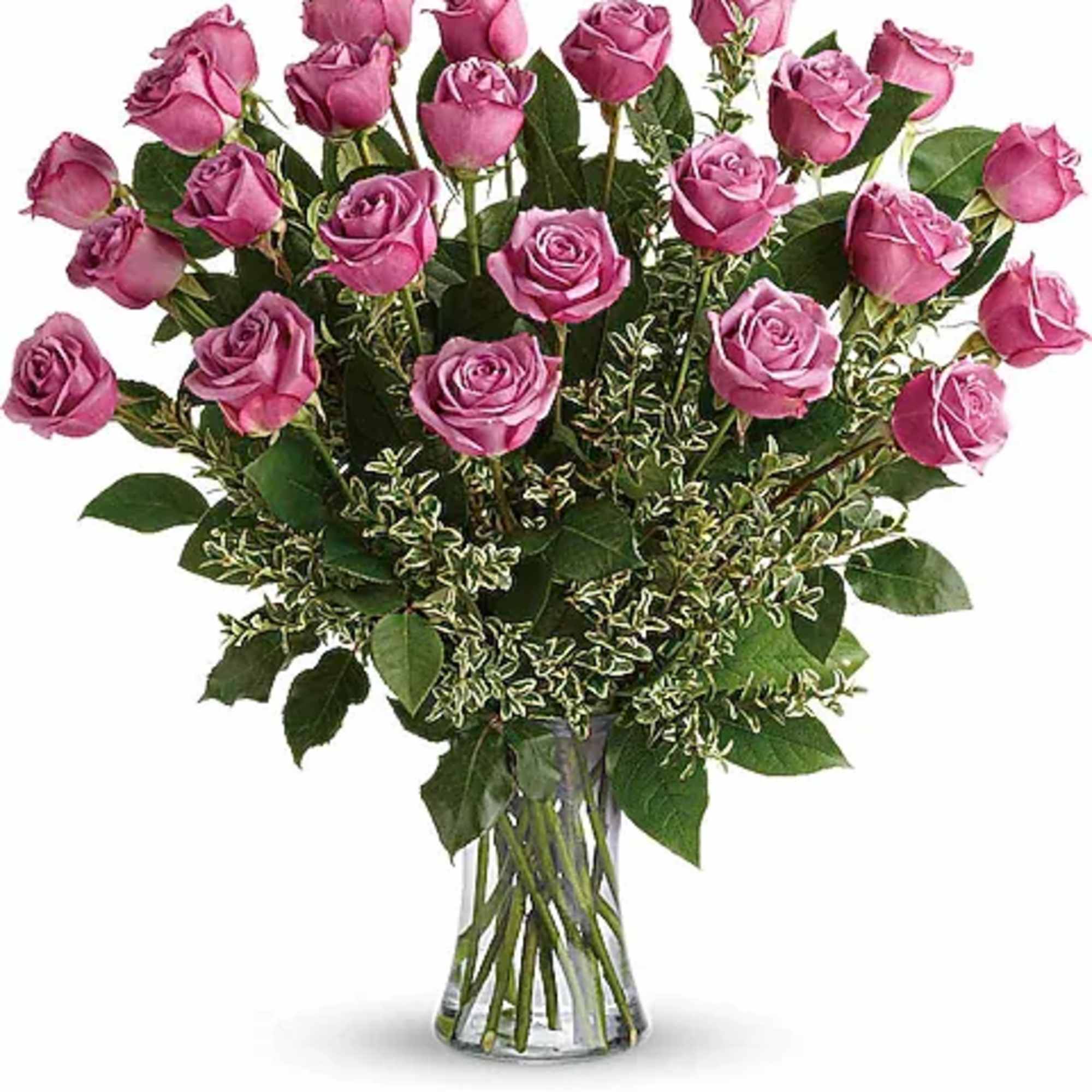 Pink roses arranged in a clear glass vase