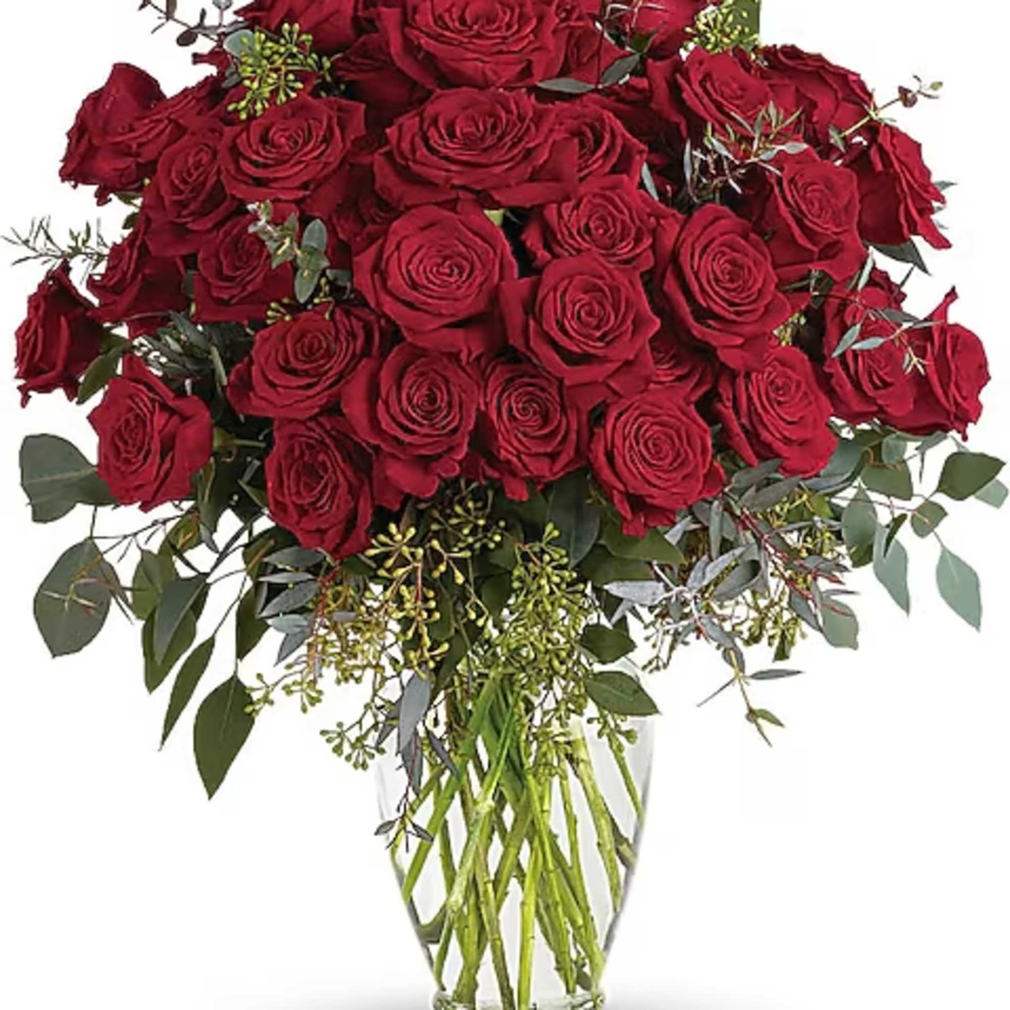 Bouquet of red roses in a clear glass vase