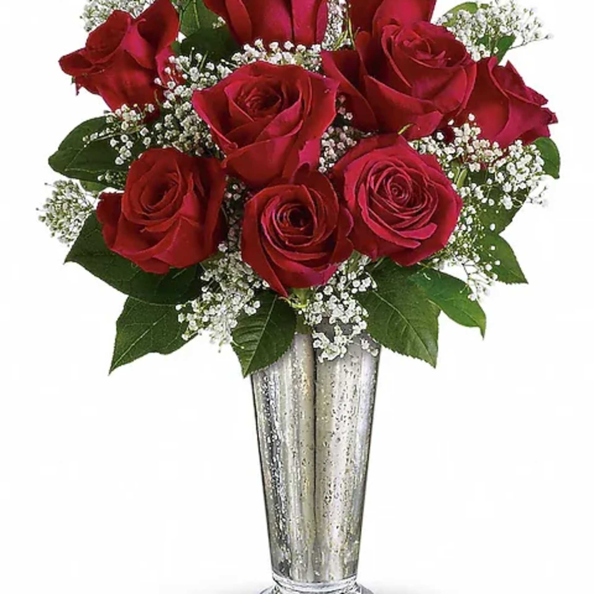 Red roses arranged in a silver vase with baby's breath