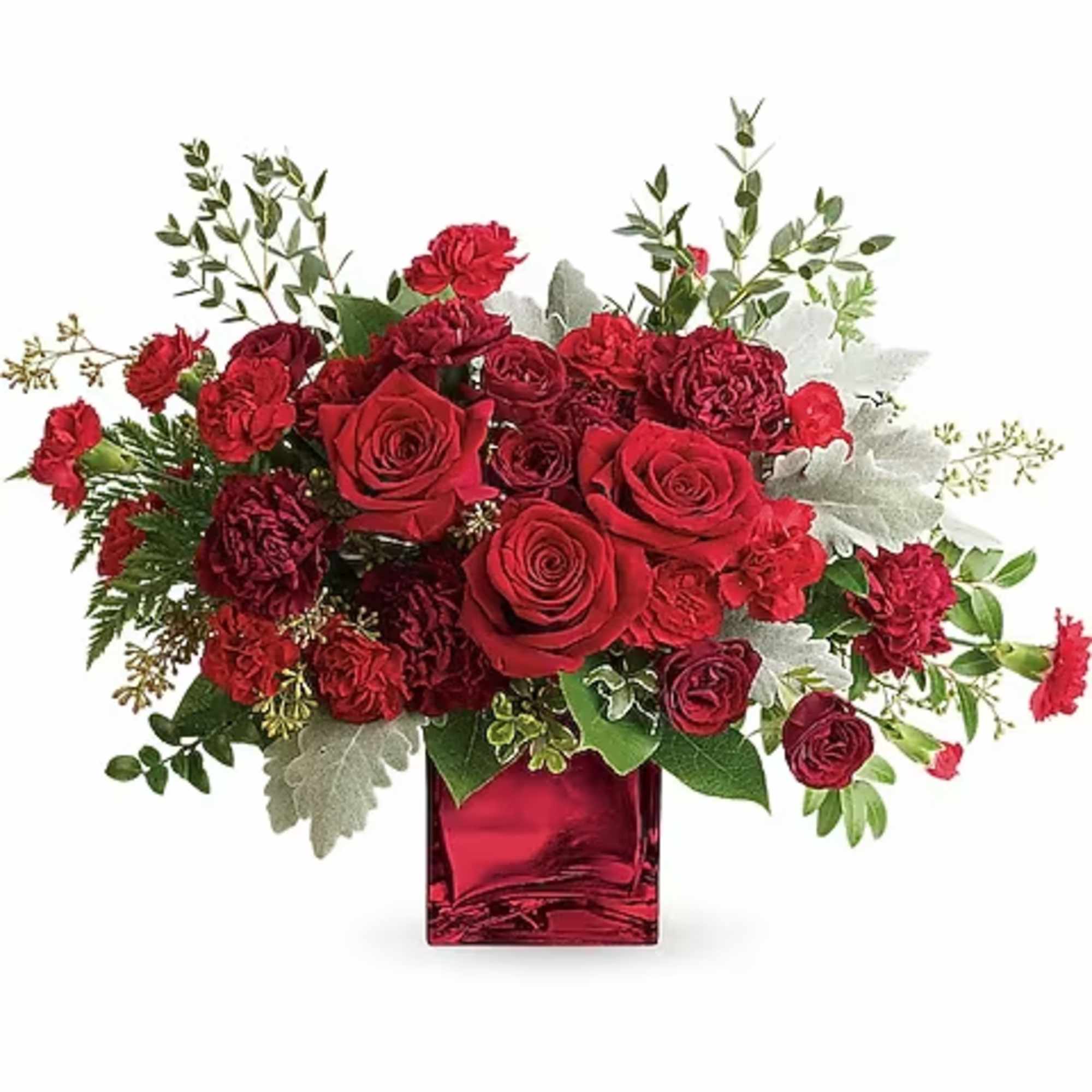 Red rose and carnation arrangement in a red glass vase