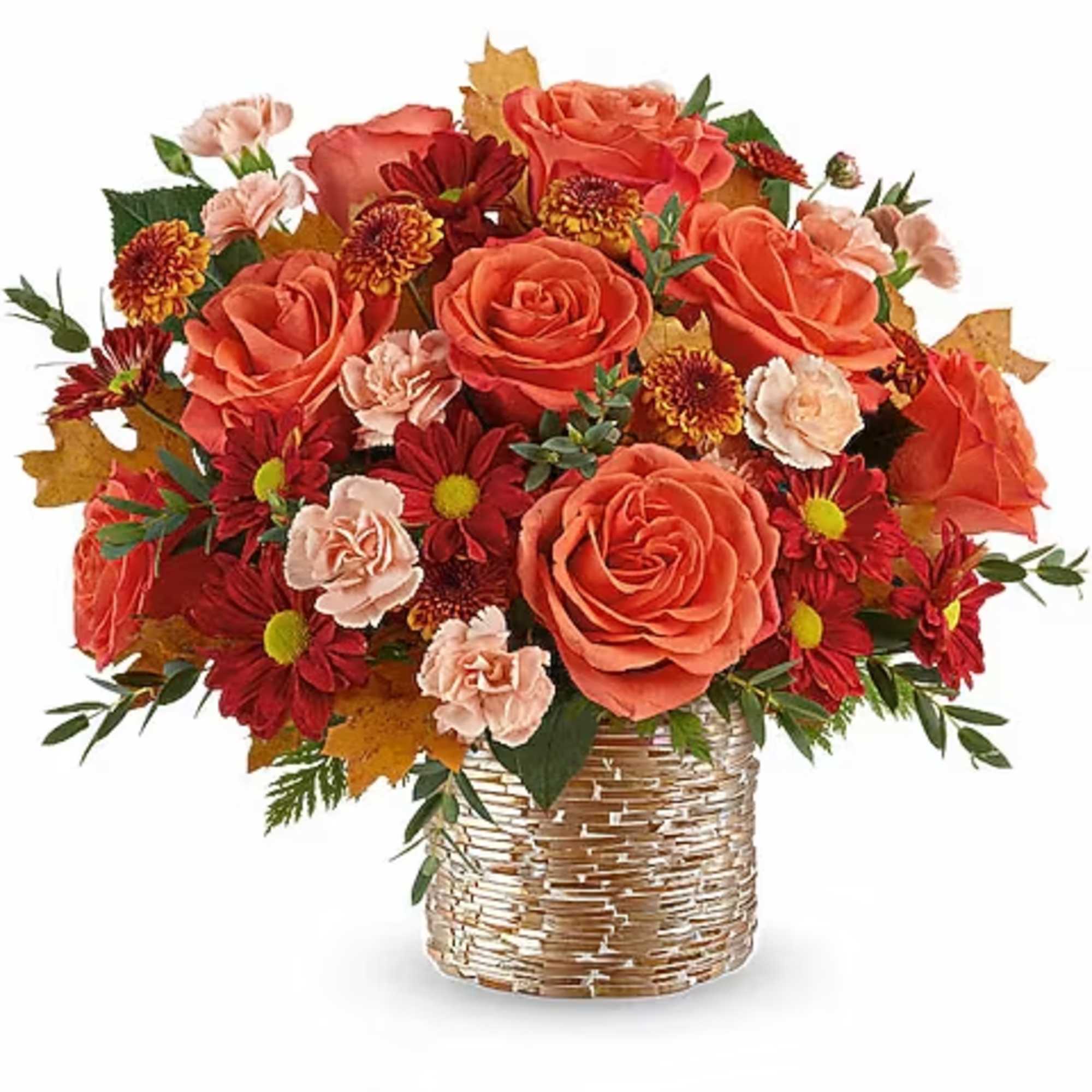 Orange roses and red mums in a woven basket