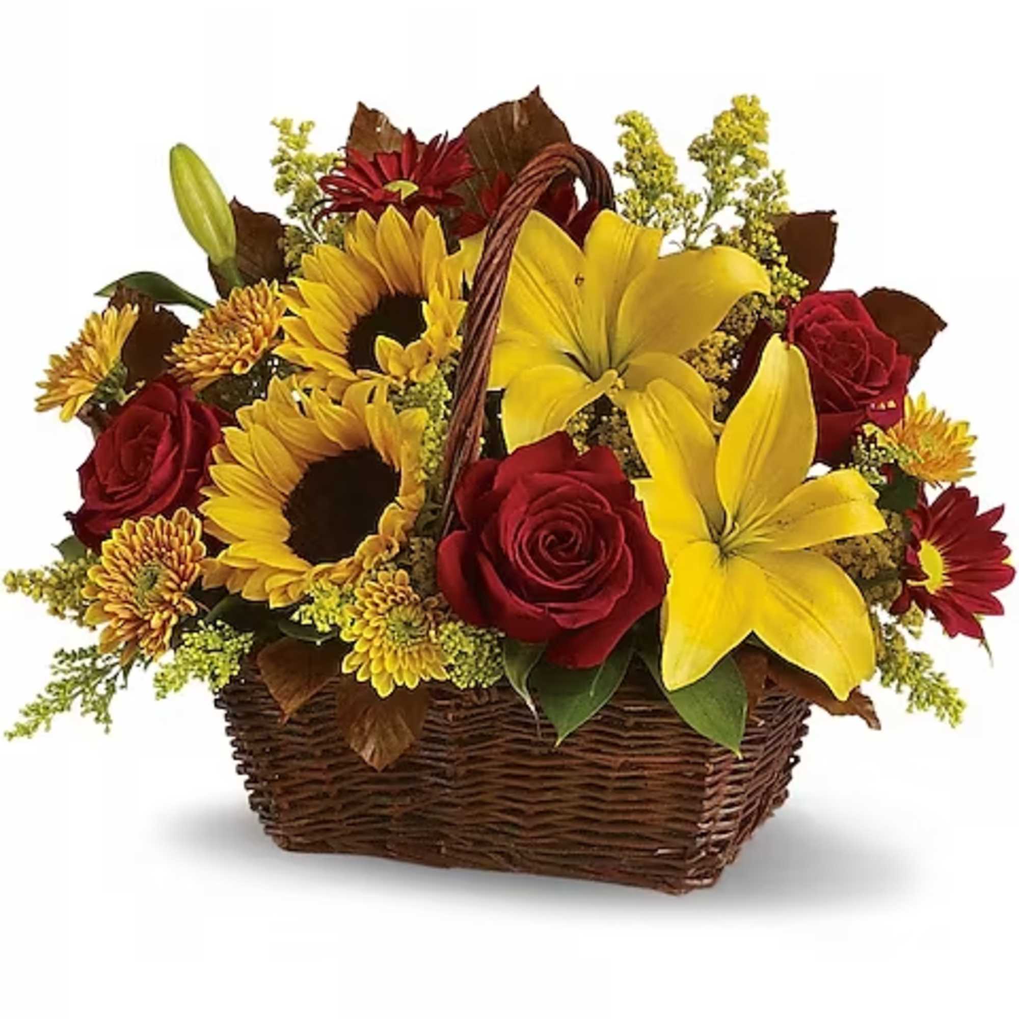 Basket arrangement with red roses, yellow lilies, and sunflowers