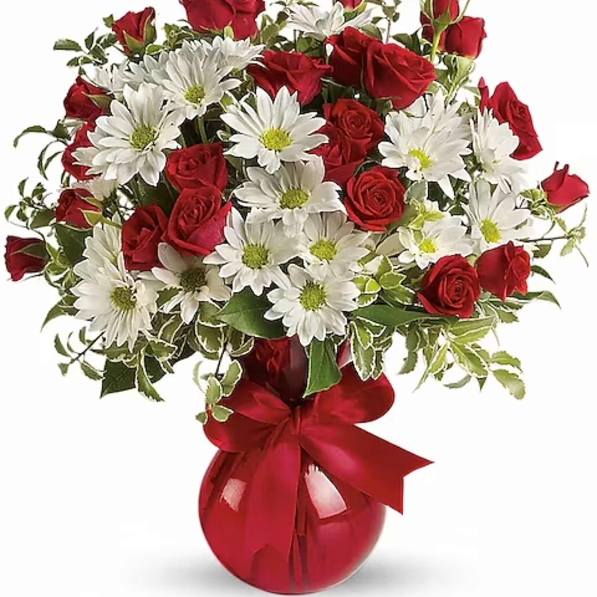 Red roses and white daisies in a red vase with a ribbon bow