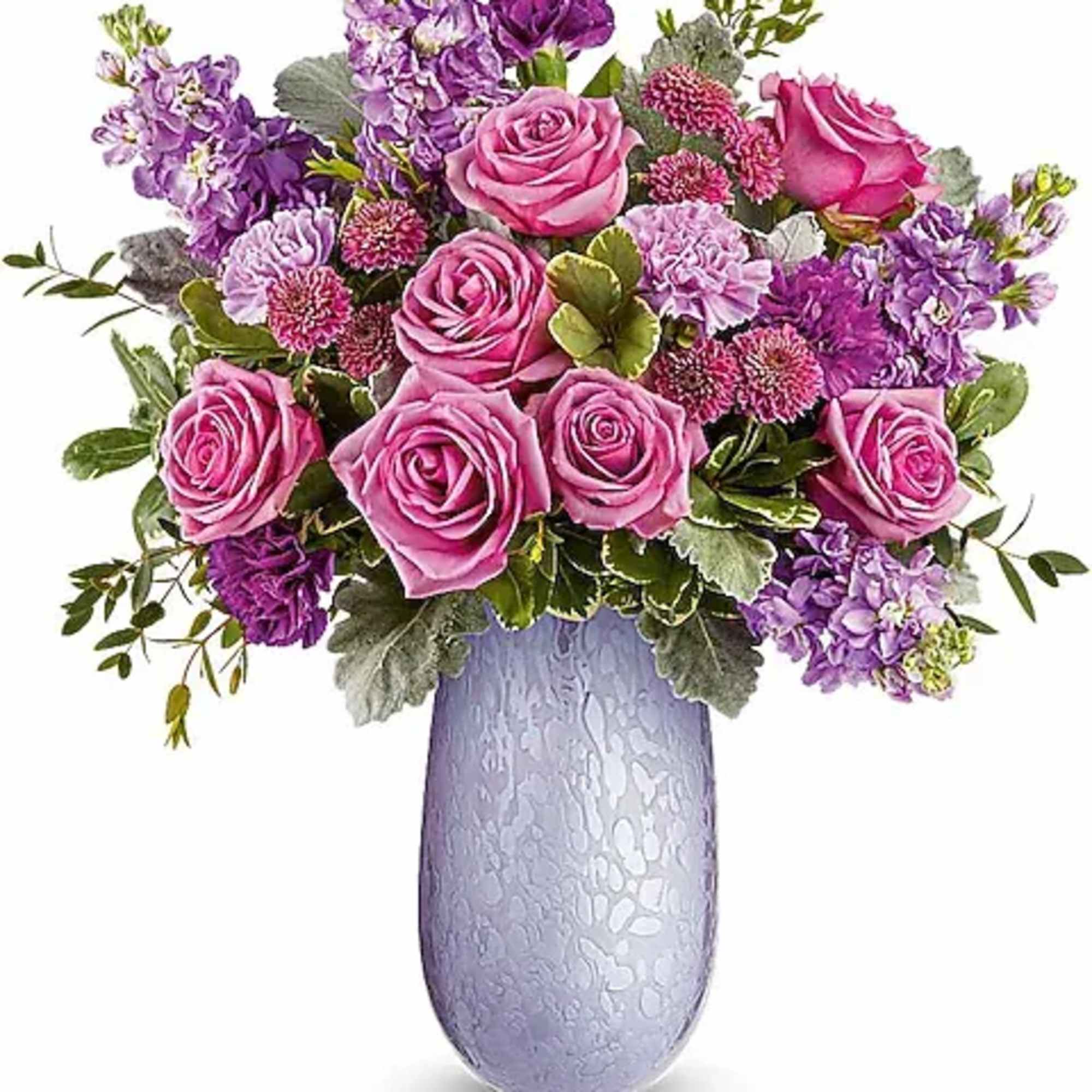 Pink and purple rose bouquet in a lavender vase