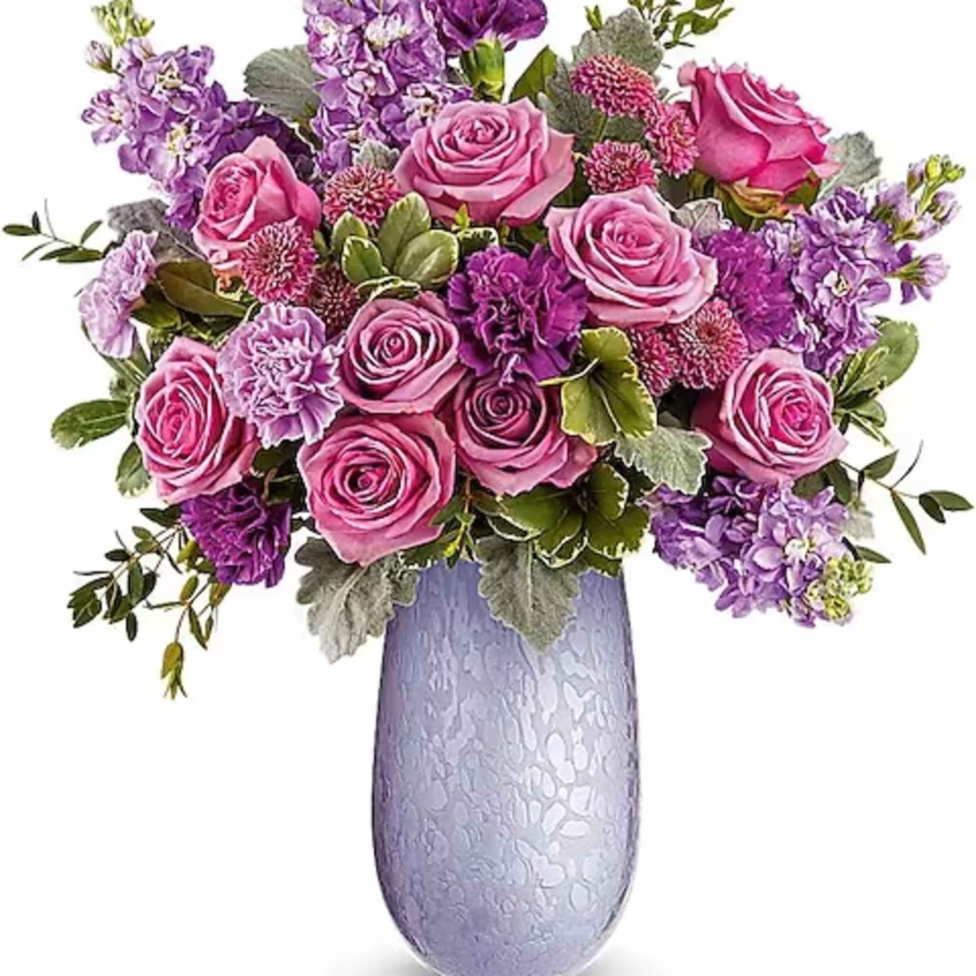 Pink and purple rose bouquet in a lavender vase