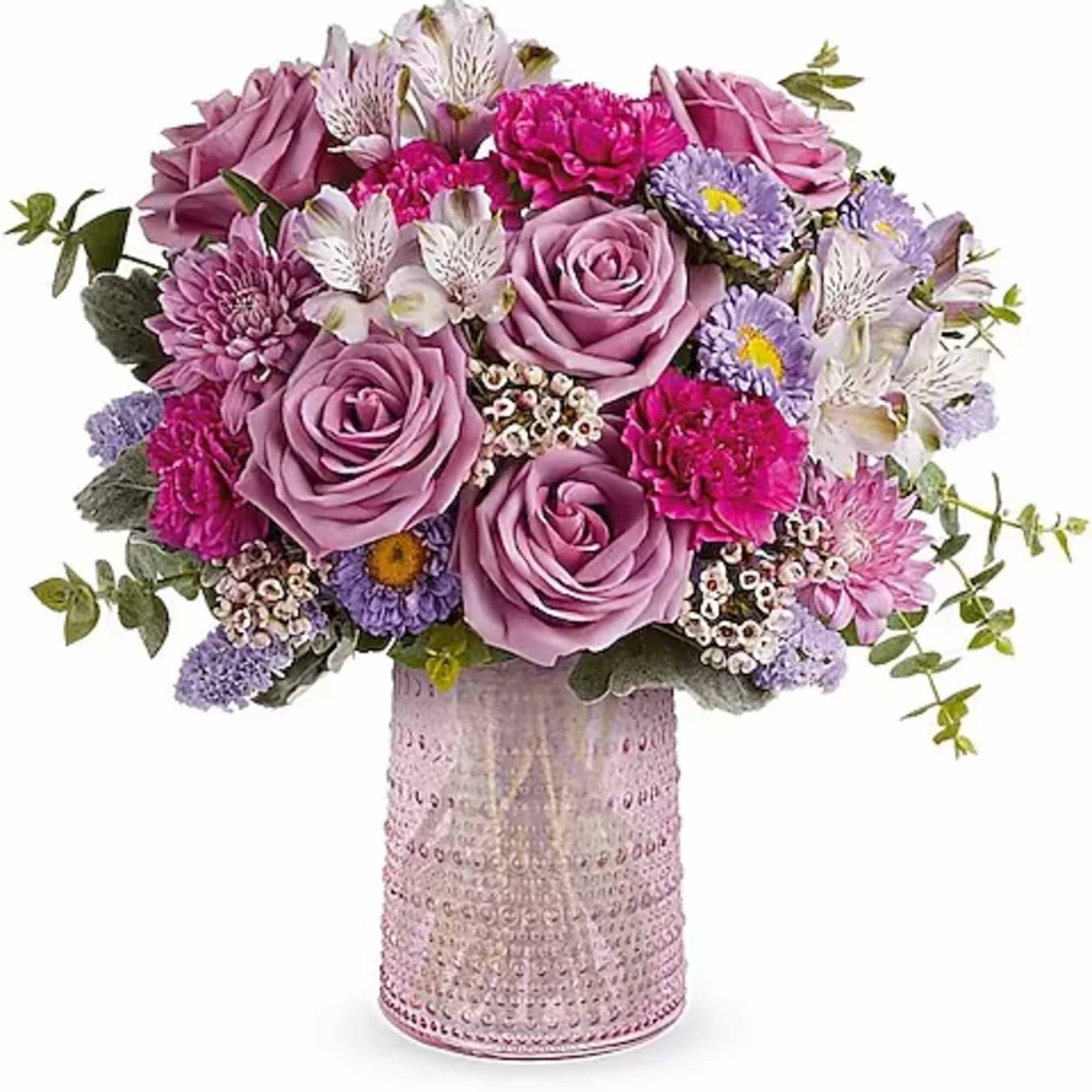Lavender and pink bouquet in a textured pink vase