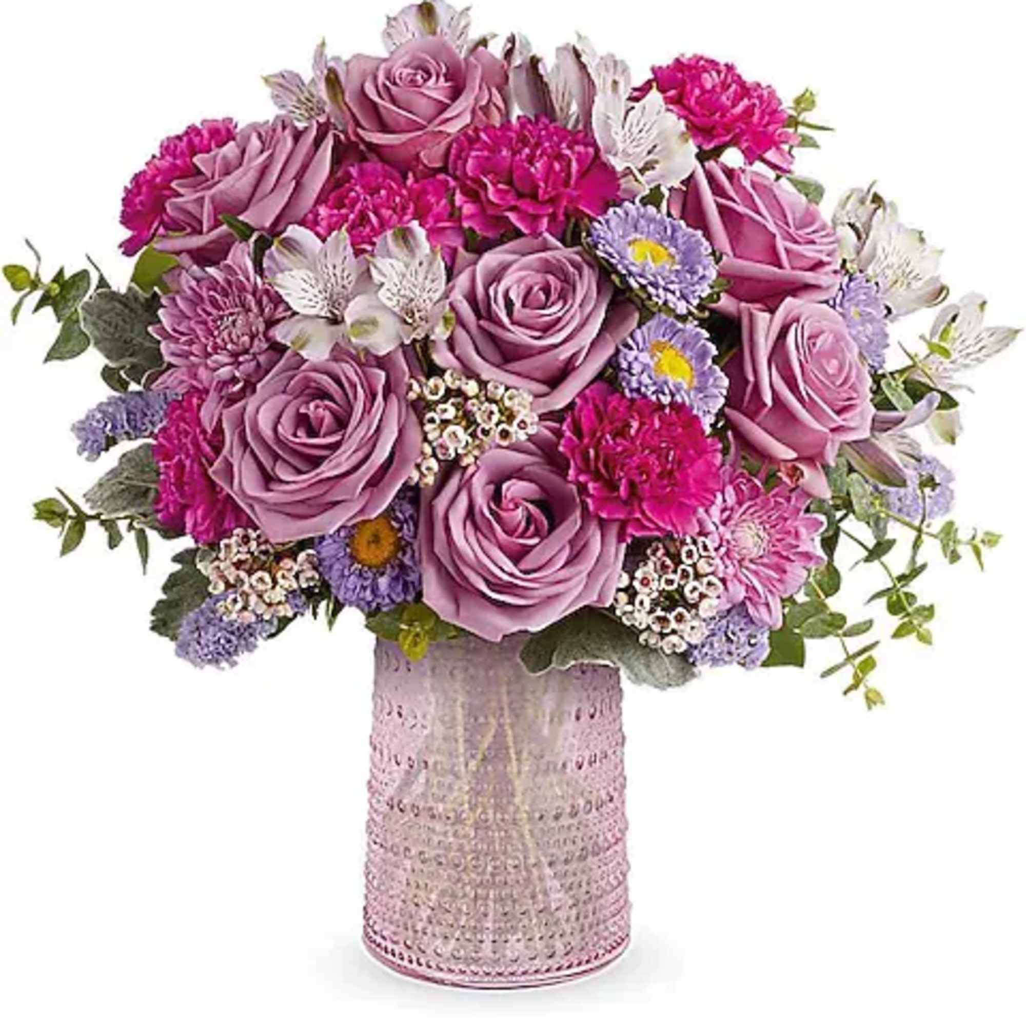 Pink and lavender bouquet in a textured glass vase