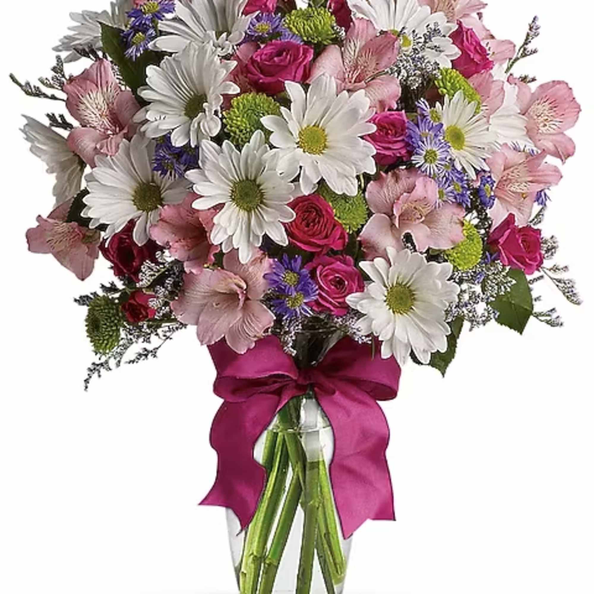 Bouquet of pink roses, white daisies, and purple flowers in a glass vase