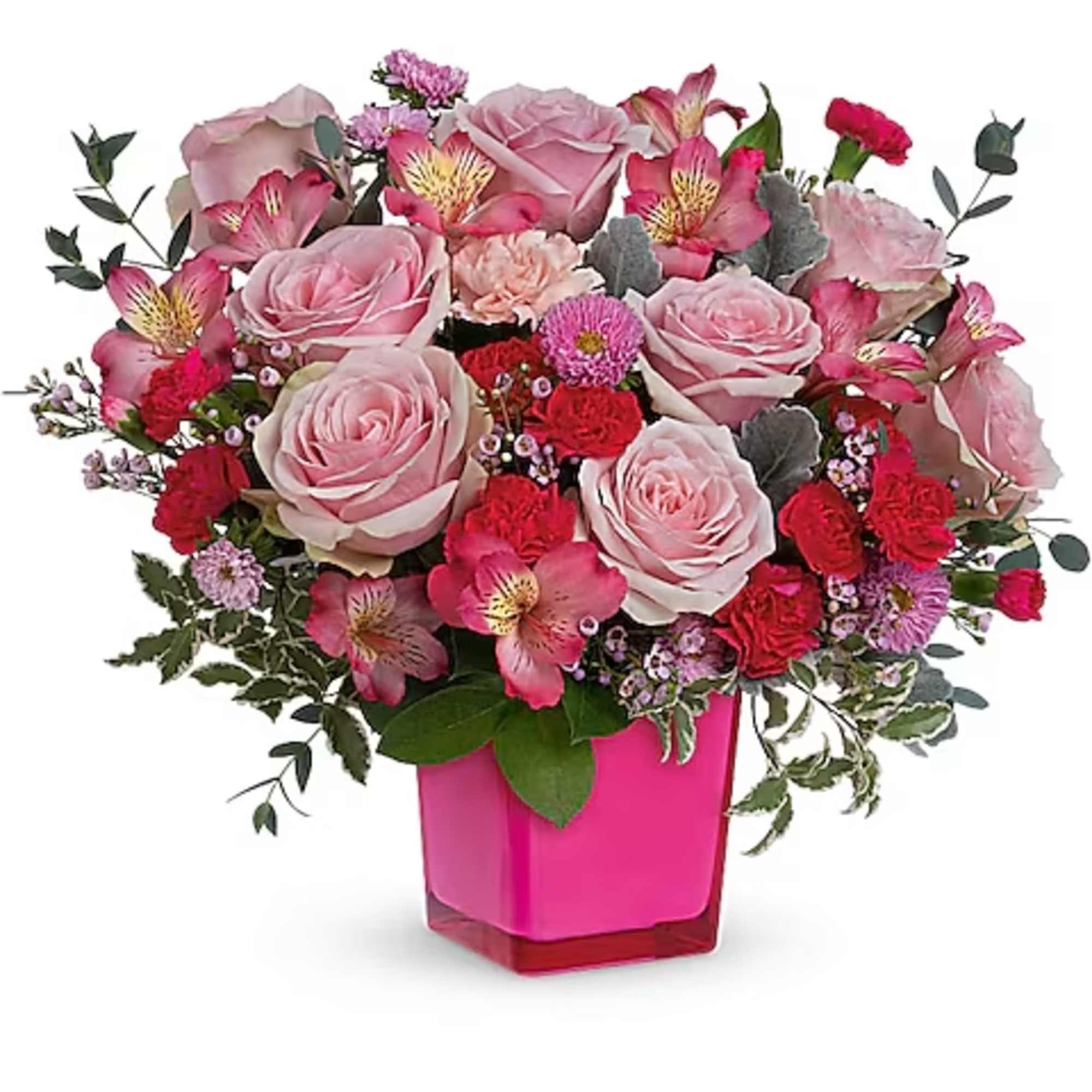 Pink rose bouquet in a bright pink vase