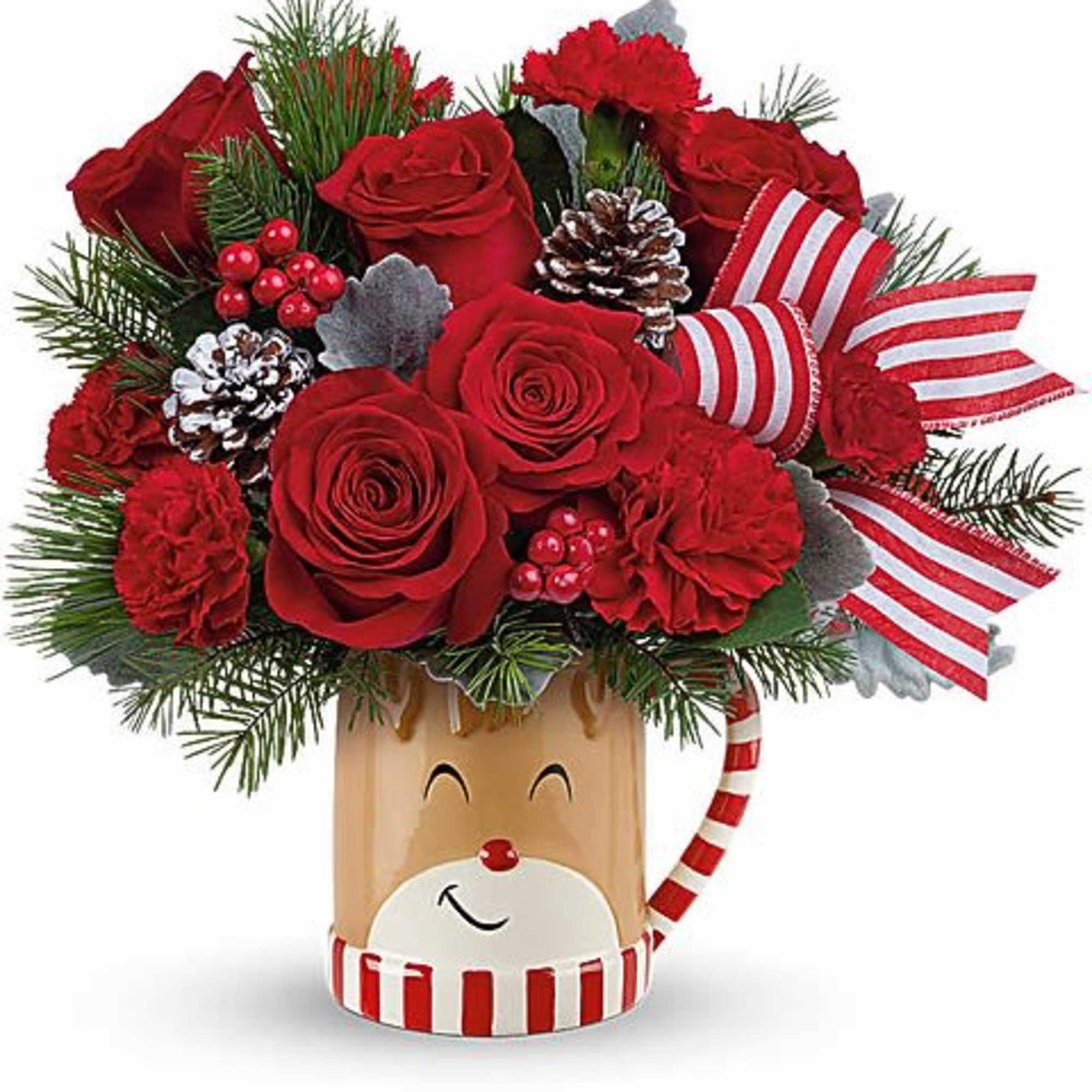 Red roses and carnations in a reindeer mug with striped ribbon