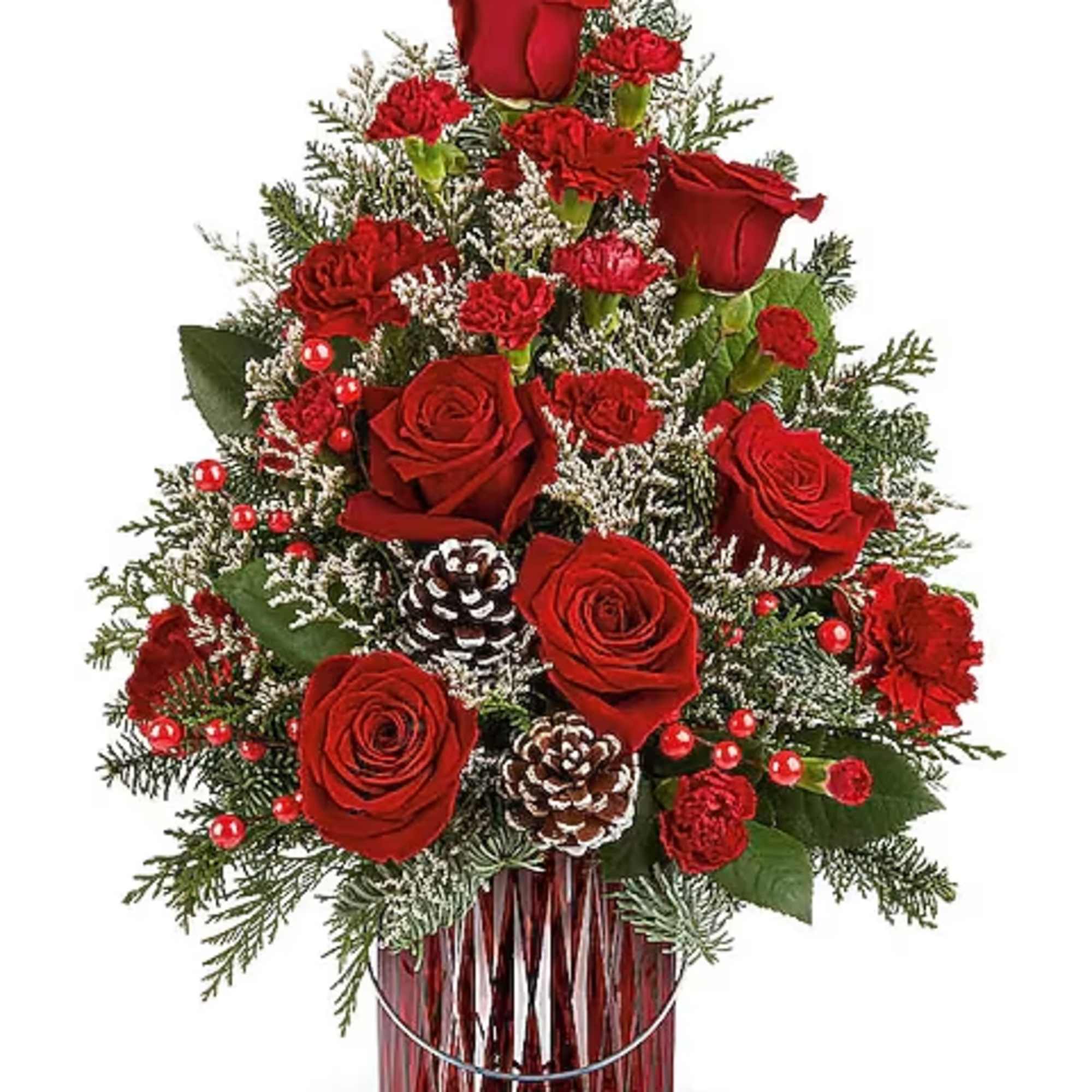 Red roses and carnations in a red glass vase with pinecones