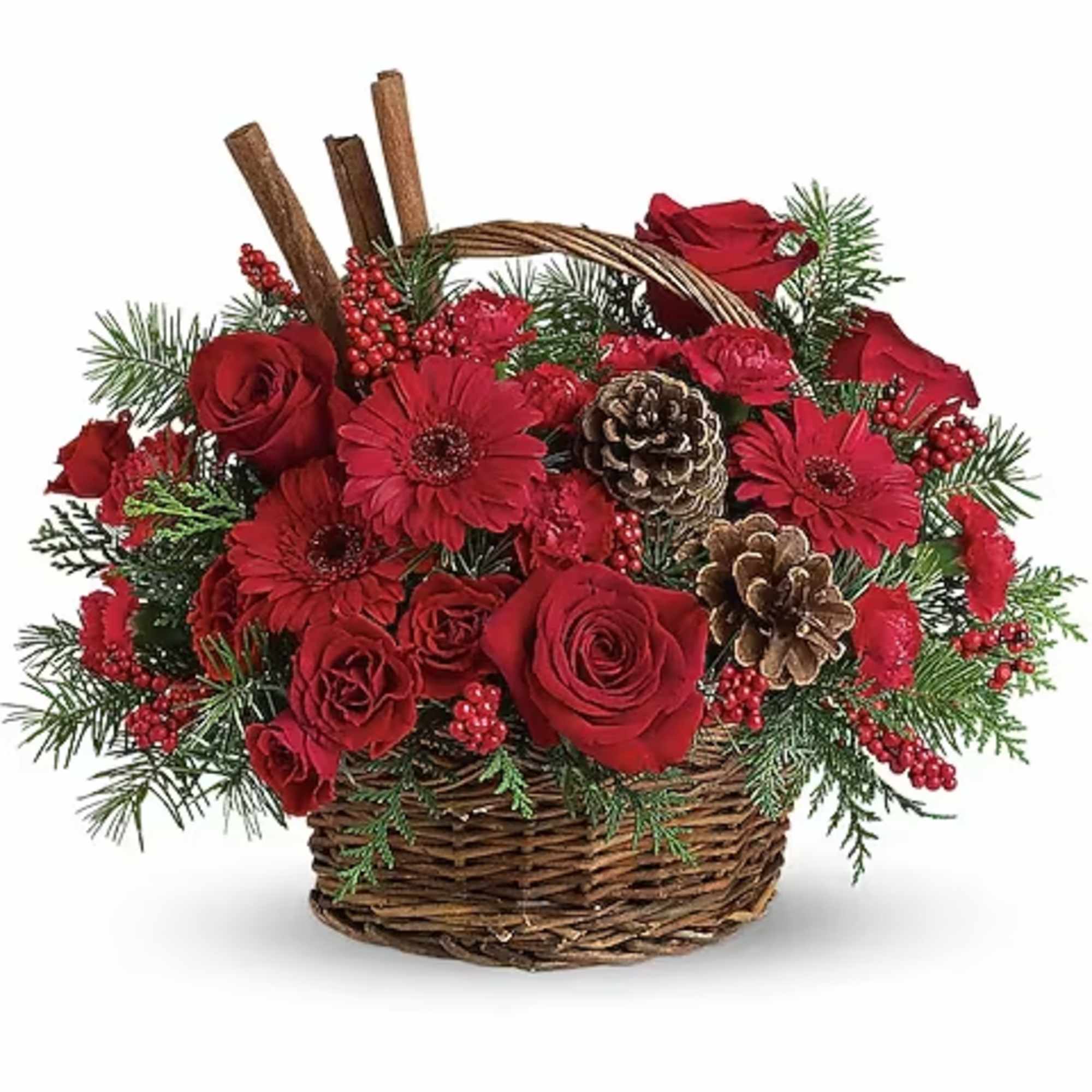 Red roses and gerbera daisies in a wicker basket with pinecones