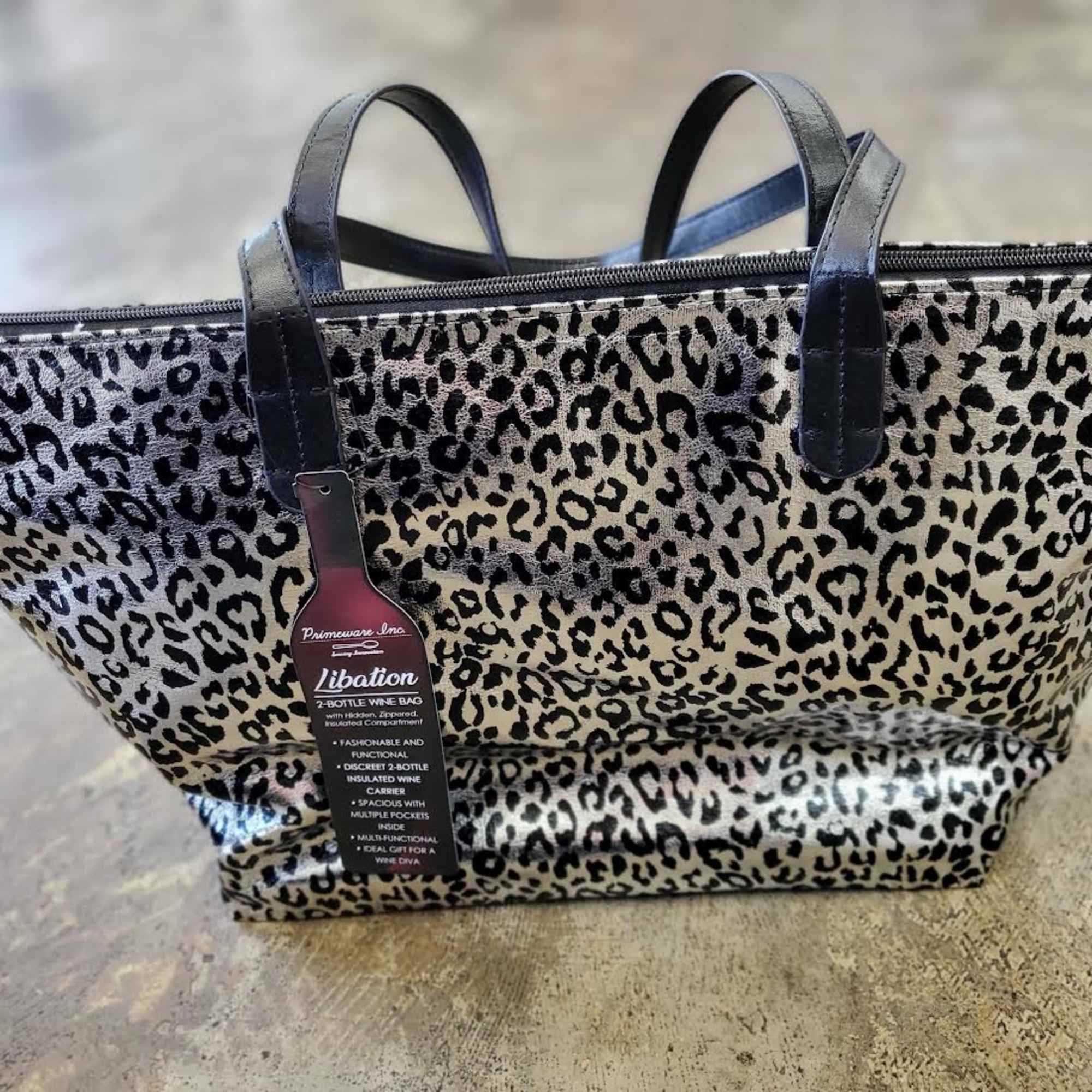 Leopard-print insulated wine tote bag with black handles and zipper