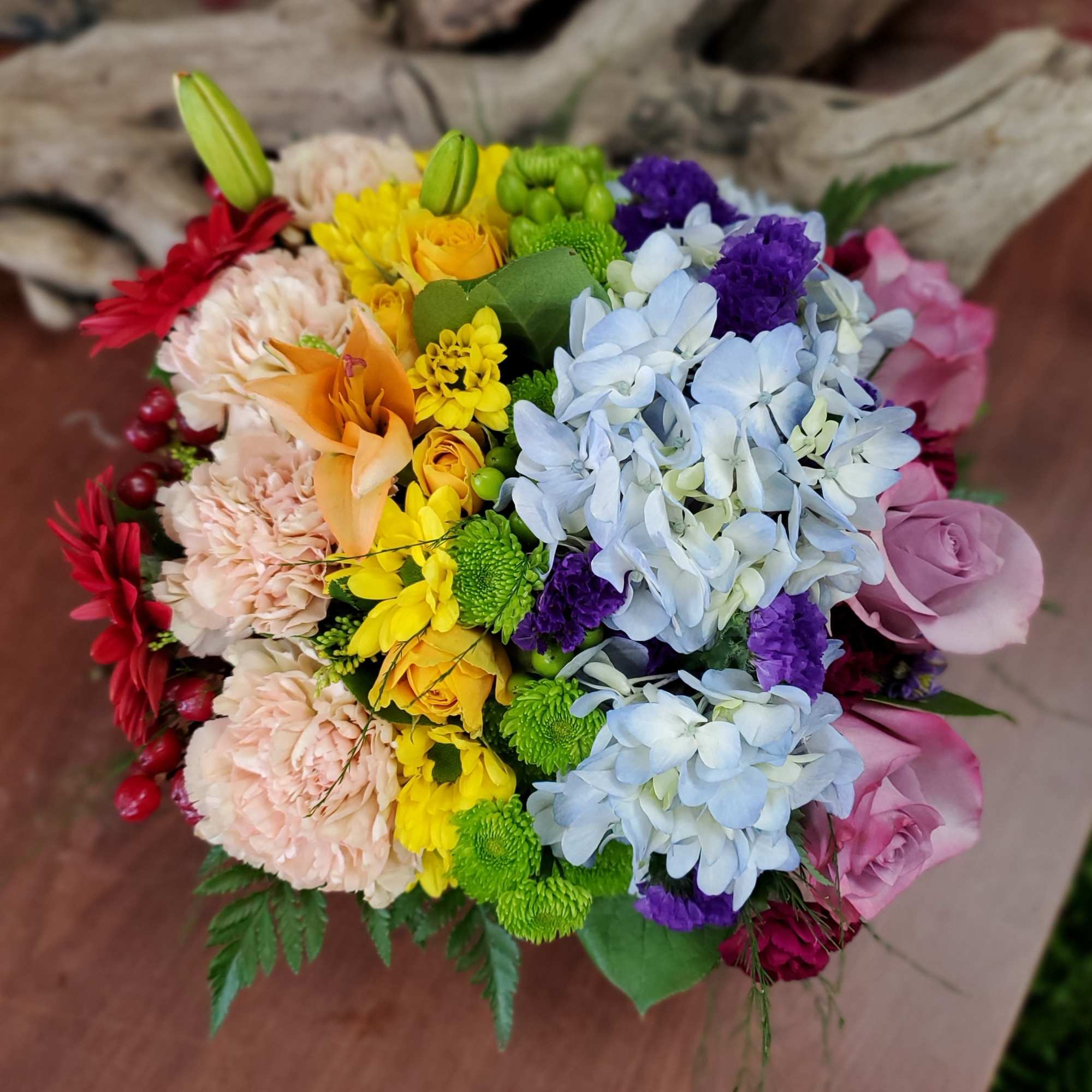 Colorful mixed bouquet with roses, hydrangeas, and chrysanthemums