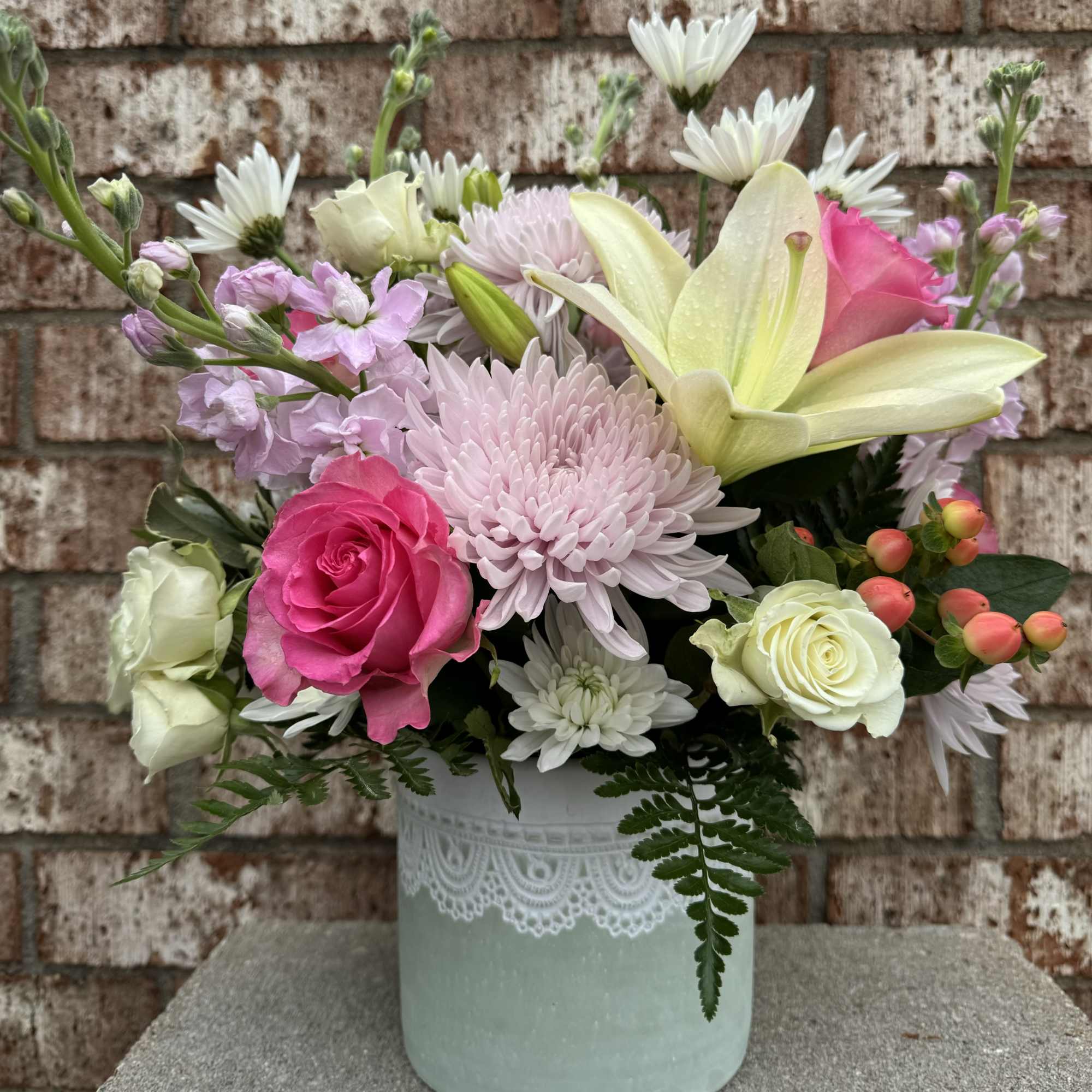 A garden of heavenly blooms offers an elegant and timeless tribute, beautifully