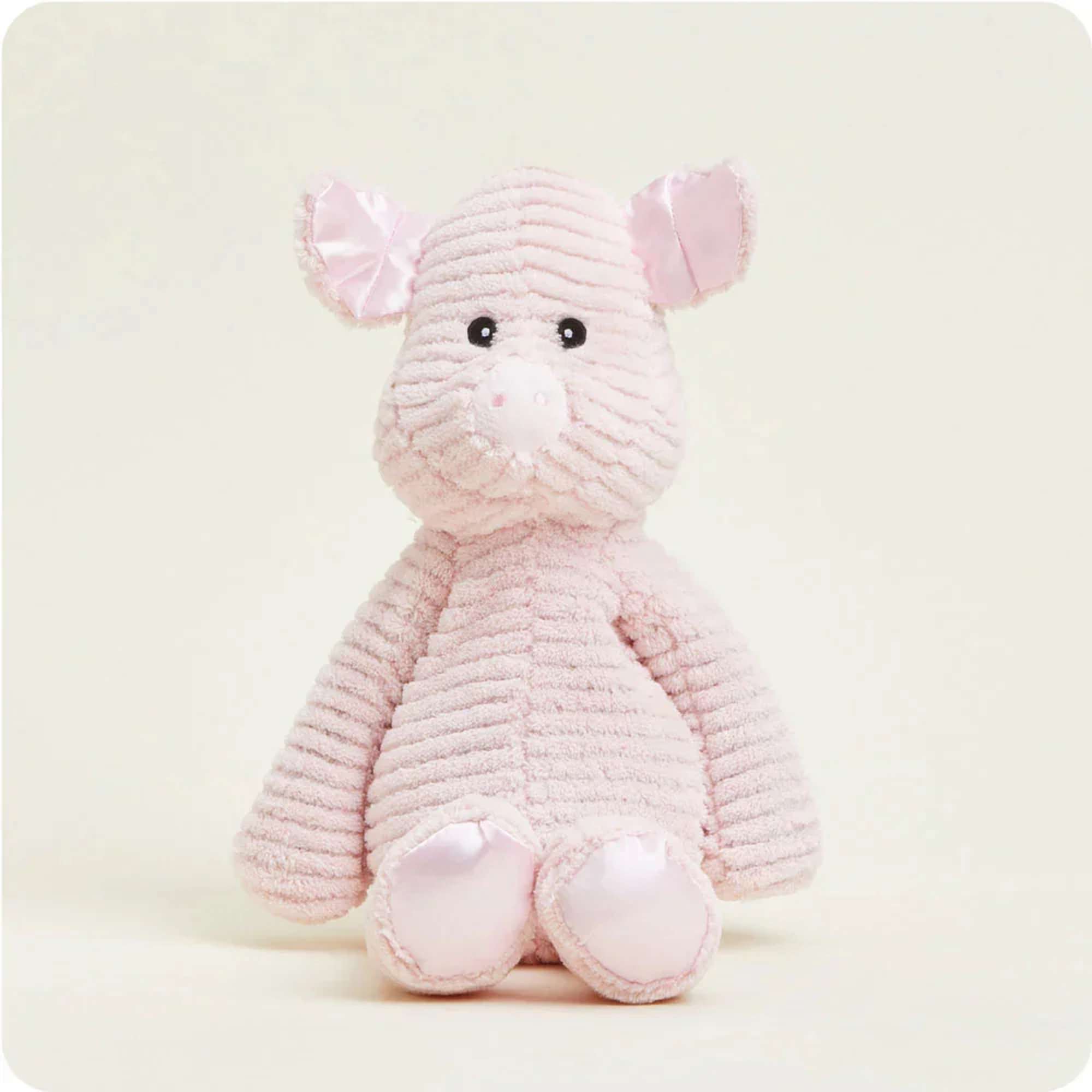 Pink plush pig toy with satin ears and feet