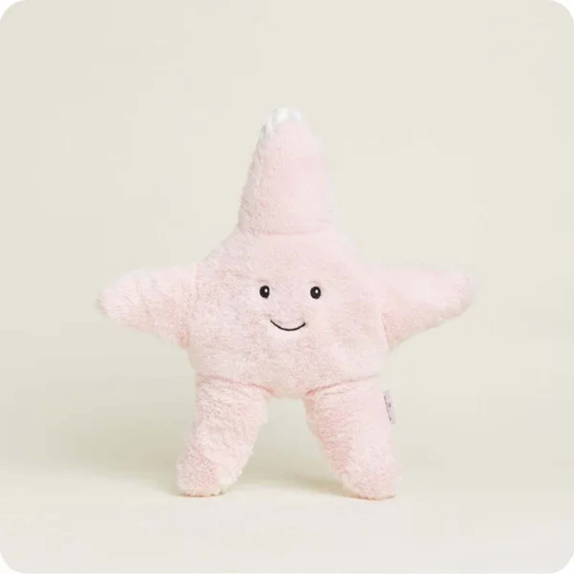 Pink star-shaped plush toy with a smiling face