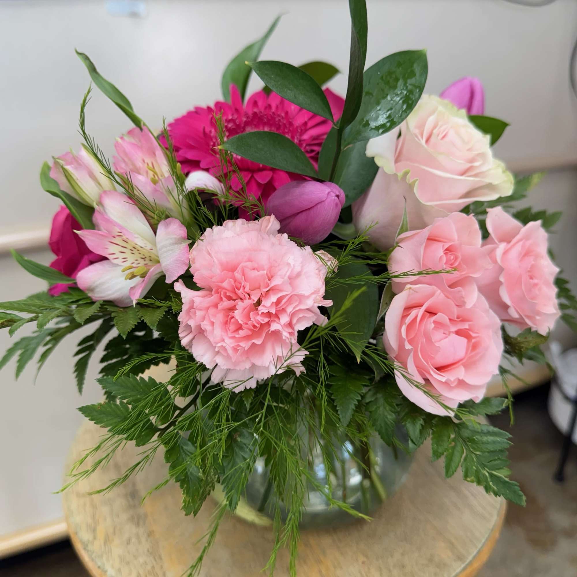 A glamorous collection of pink flowers such as roses, gerbera daisies, minicarnations, photo 4 of 4